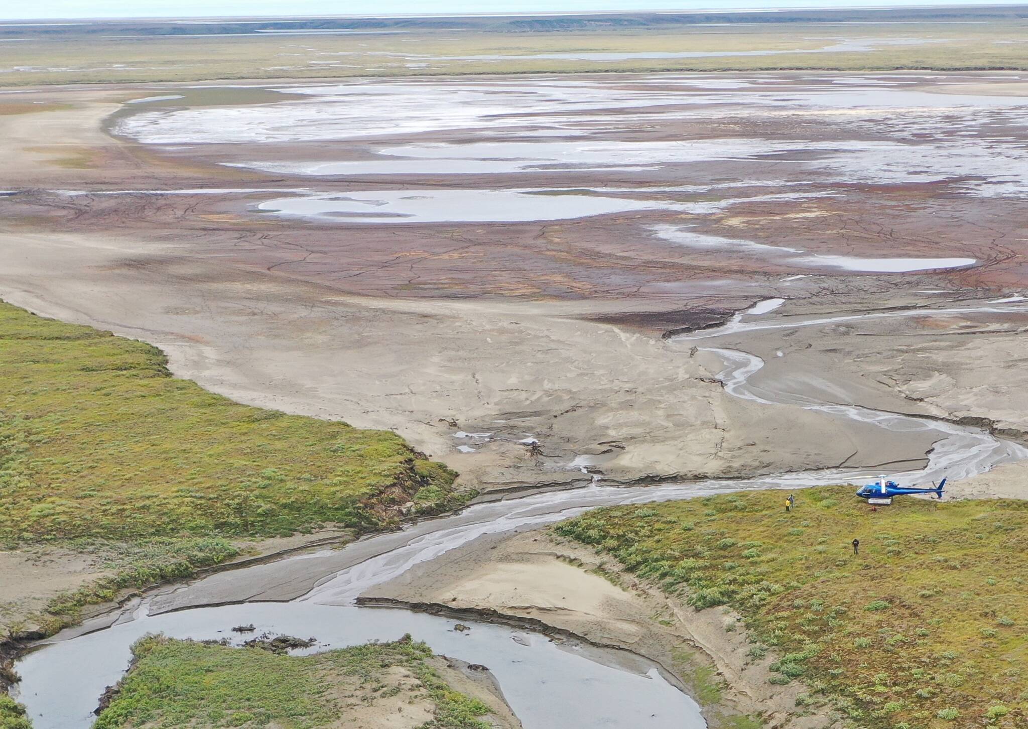 Courtesy Photo / Allen Bondurant 
Harry Potter Lake, at the top of this drone photo, after most of its water drained into a nearby creek on Alaska’s North Slope in early July 2022.