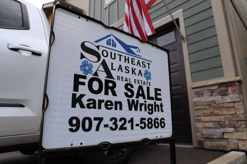 A for sale sign sits outside a condo in the Mendenhall Valley area. The realtor for the property, Karen Wright, said the City and Borough of Juneau’s recently released FAQ did have some accurate information, but said it also left out some information that would give people a more accurate picture of what was happening as a whole. (Clarise Larson / Juneau Empire)