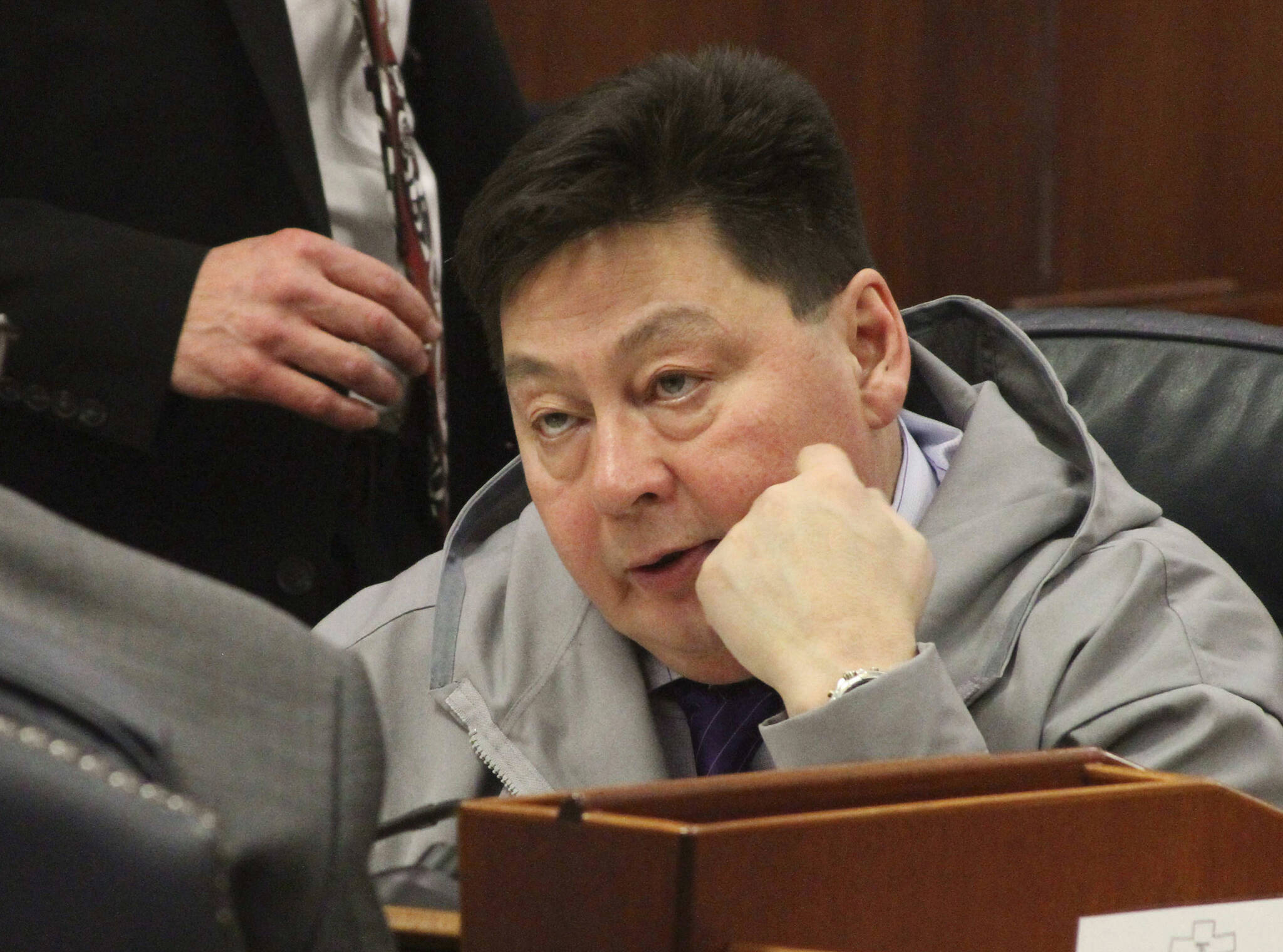 In this Jan. 17, 2017, photo state Rep. Dean Westlake, D-Kotzebue, talks with another legislator during a break in the opening session of the Alaska Legislature in Juneau, Alaska. The son of the former Alaska lawmaker faces charges of manslaughter and evidence tampering in death of his father, according to charging documents. Tallon Westlake was arrested over the weekend. An online court records system did not show an attorney Monday, Aug. 22, 2022 who could speak on his behalf. The charging documents are dated Sunday. (AP File Photo / Mark Thiessen)