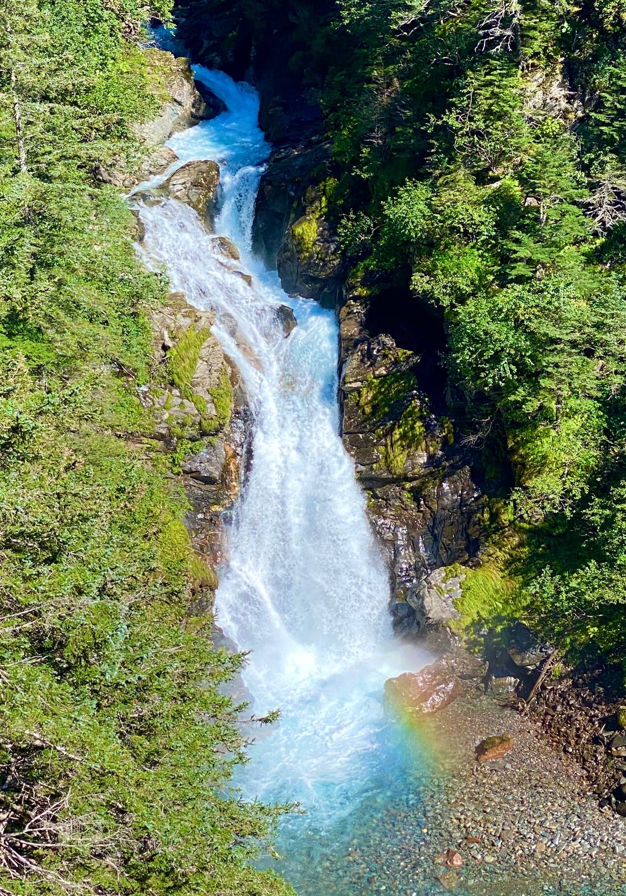 Ebner Falls creates a rainbow as Gold Creek cascades down to rocks below. (Courtesy Photo / Denise Carroll)