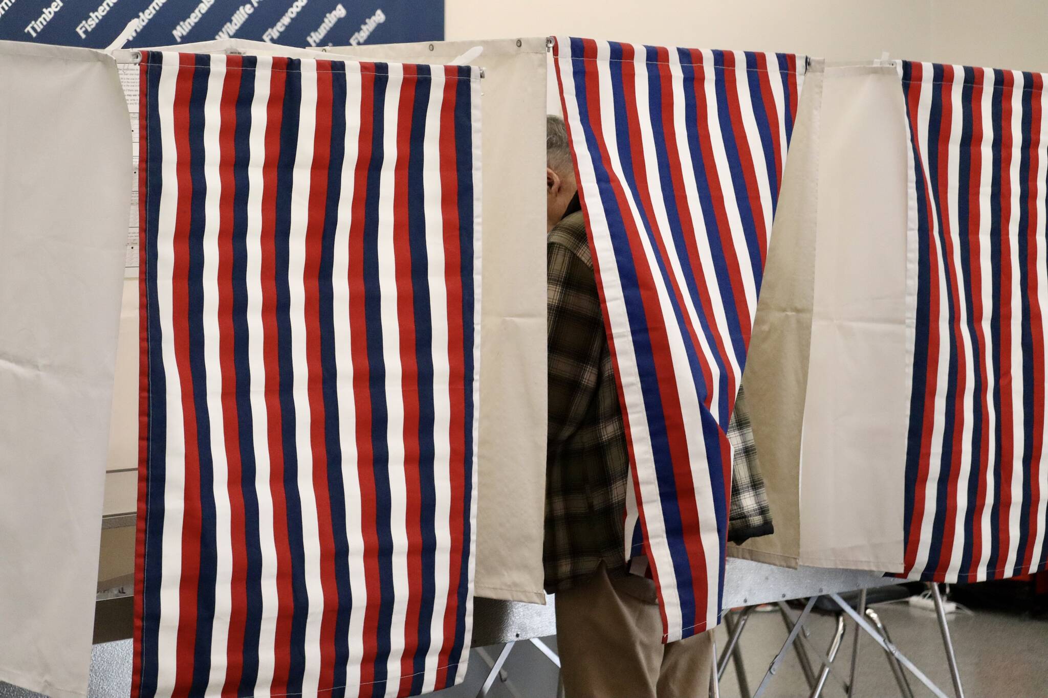 A voter in Juneau fills out their ballot during the Aug. 16 special general and primary elections. Two rural Alaska communities failed to open polling places on Election Day. (Jonson Kuhn / Juneau Empire File)