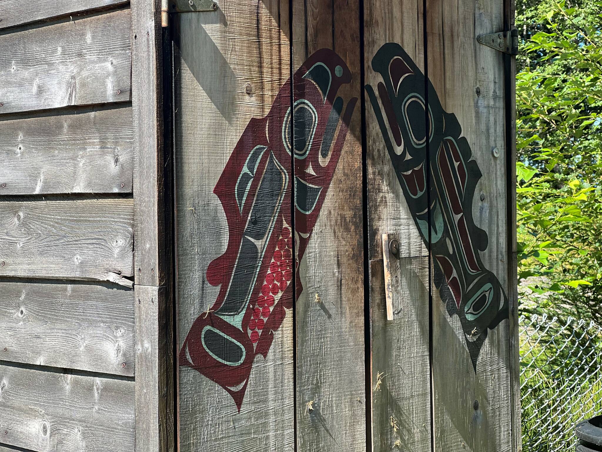 Salmon Northwest Coast art on the Wrangell Cooperative Association community smokehouse. (Vivian Faith Prescott / For the Capital City Weekly)