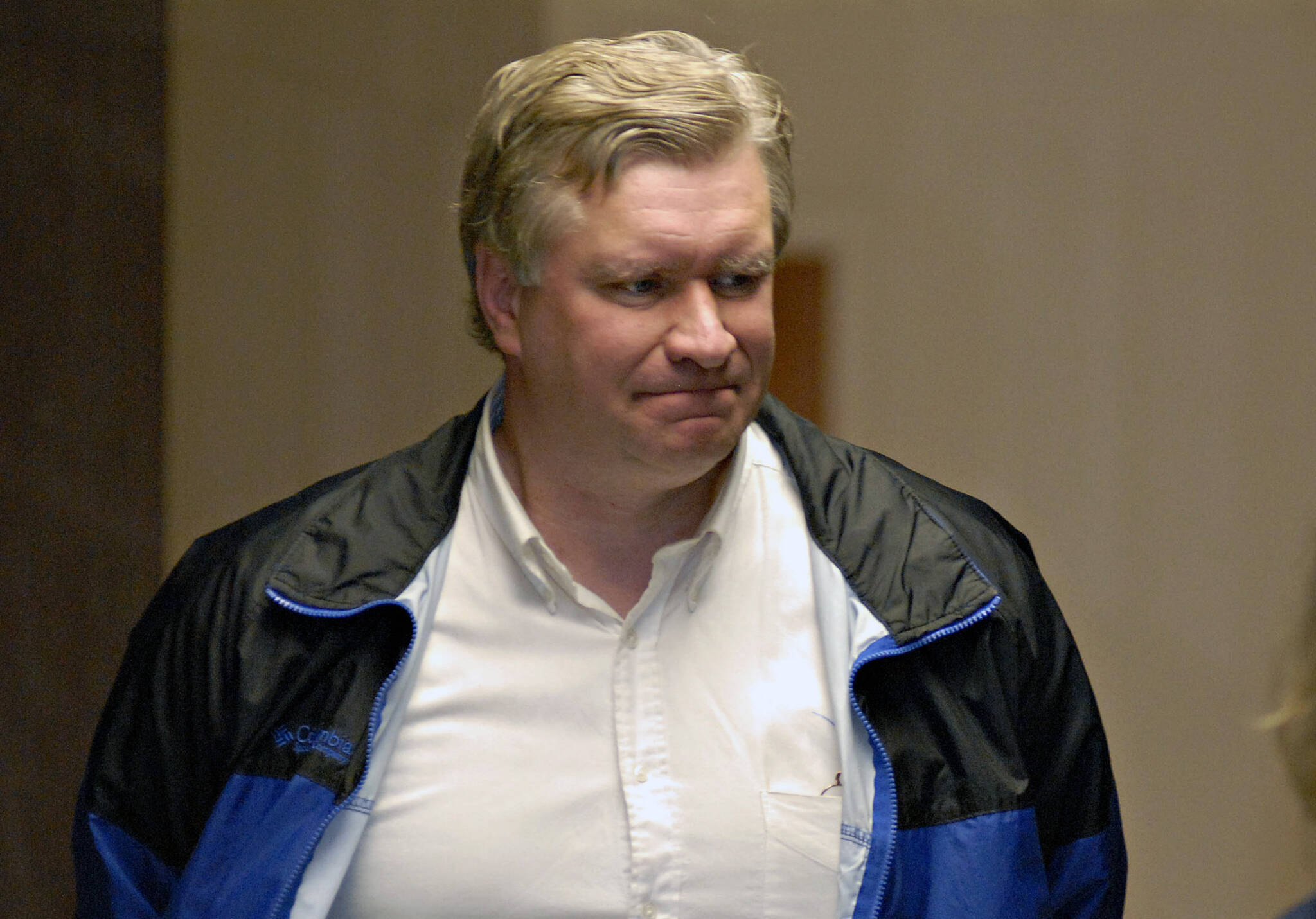 Alaska Rep. Victor Kohring, R-Wasilla, is led into the Federal Court Room for arraignment in Juneau, Alaska on Friday, May 4, 2007. Kohring, a former Alaska lawmaker who was caught up in a corruption scandal that roiled the state Legislature more than 15 years ago, has died in a vehicle crash. (AP File Photo / Chris Miller)