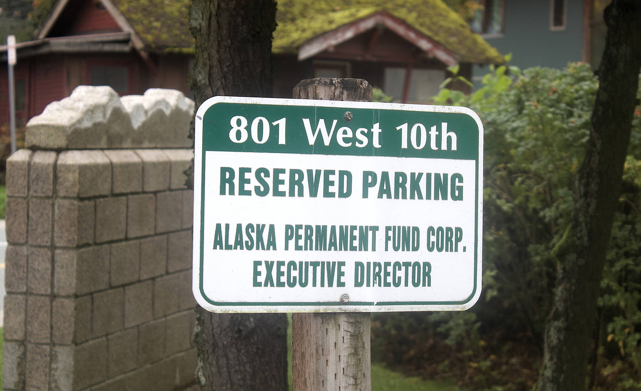 A parking sign awaits the new executive director of the Alaska Permanent Fund at its Juneau headquarters, Three finalists will be interviewed for the job during a public meeting Monday by the fund’s board of trustees, who are expected to deliberate and announce the new director immediately afterward. (Mark Sabbatini / Juneau Empire)