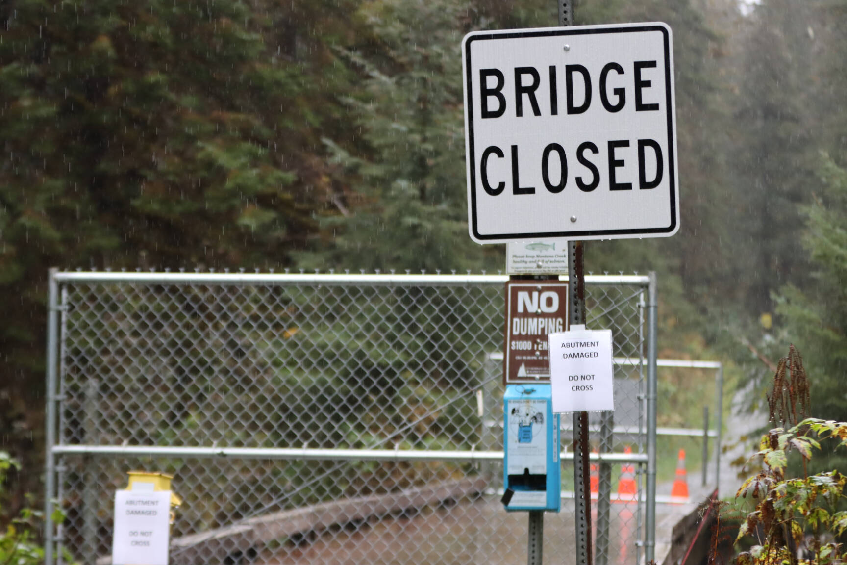 After weeks of heavy rainfall, multiple portions of the Montana Creek Bridge were closed after sustaining weather-related damage. (Jonson Kuhn / Juneau Empire)