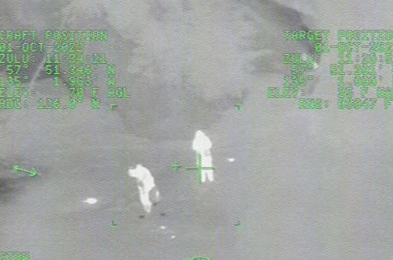 The U.S. Coast Guard District 17 released video footage of two people being rescued during stormy conditions on Saturday, Oct. 1 after their boat ran onto rocks in Pavlof Harbor in southwest of Juneau. (Courtesy Photo / U.S. Coast Guard)