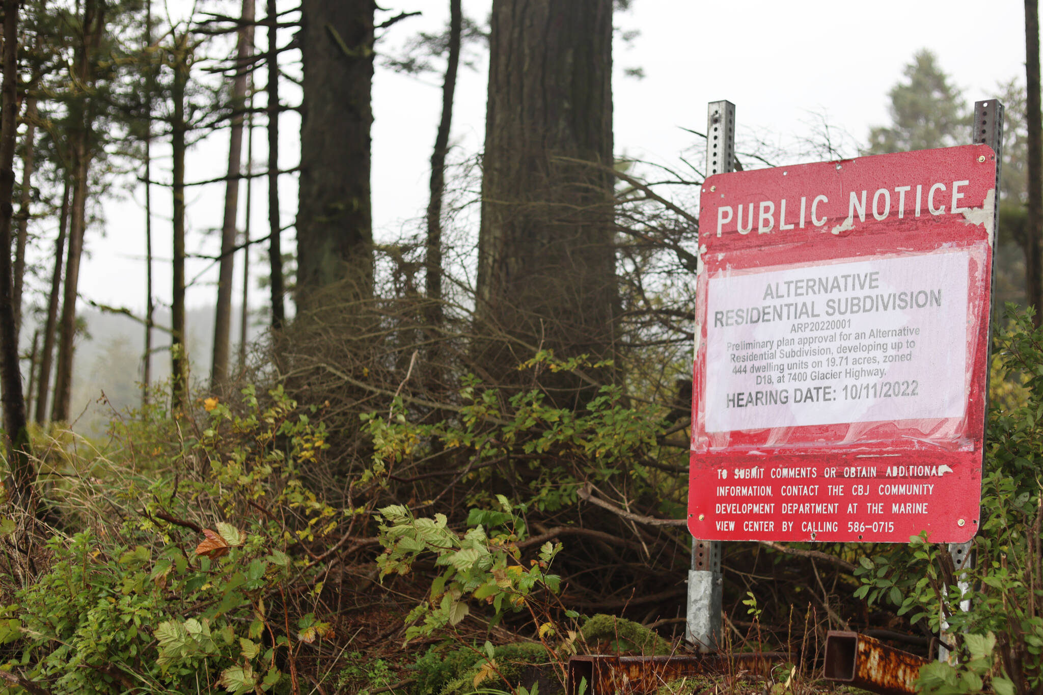 A sign stands at the site of a proposed 444-unit subdivision along the 7400 block of Glacier Highway in Juneau. (Jonson Kuhn / Juneau Empire)
Jonson Kuhn / Juneau Empire 
A sign stands at the site of a proposed 444-unit subdivision along the 7400 block of Glacier Highway in Juneau.