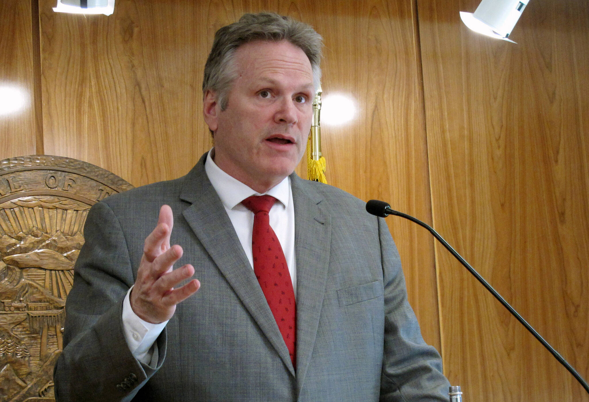 Gov. Mike Dunleavy speaks to reporters during a news conference at the state Capitol on April 28, 2022, in Juneau, Alaska. Nearly every single Alaskan got a financial windfall amounting to more than $3,000 on Tuesday, Sept. 20, 2022, the day the state began distributing payments from Alaska’s investment fund that has been seeded with money from the state’s oil riches. (AP Photo/Becky Bohrer, File)