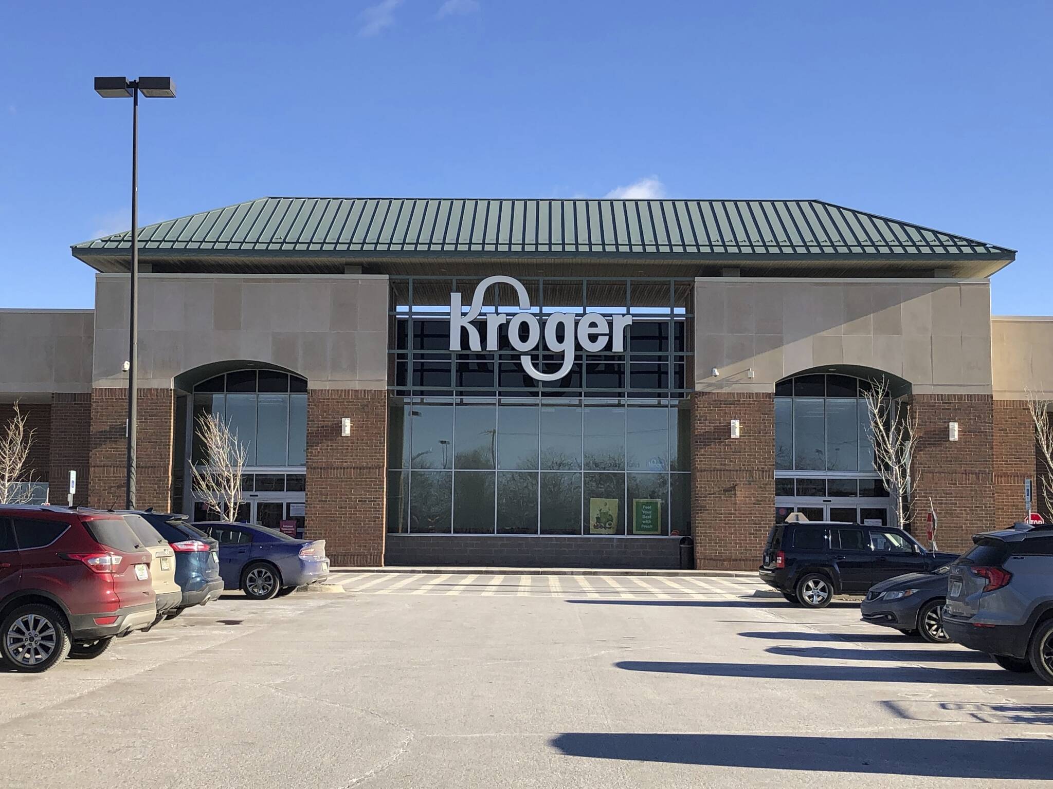 FILE - Exterior of the Kroger grocery store in Novi, Mich., is seen Saturday, Jan. 23, 2021.  Two of the nation's largest grocers are planning to merge. Kroger said Friday, Oct. 14, 2022, it has agreed to acquire Albertsons in a $20 billion deal.  (Ed Pevos / Ann Arbor News)