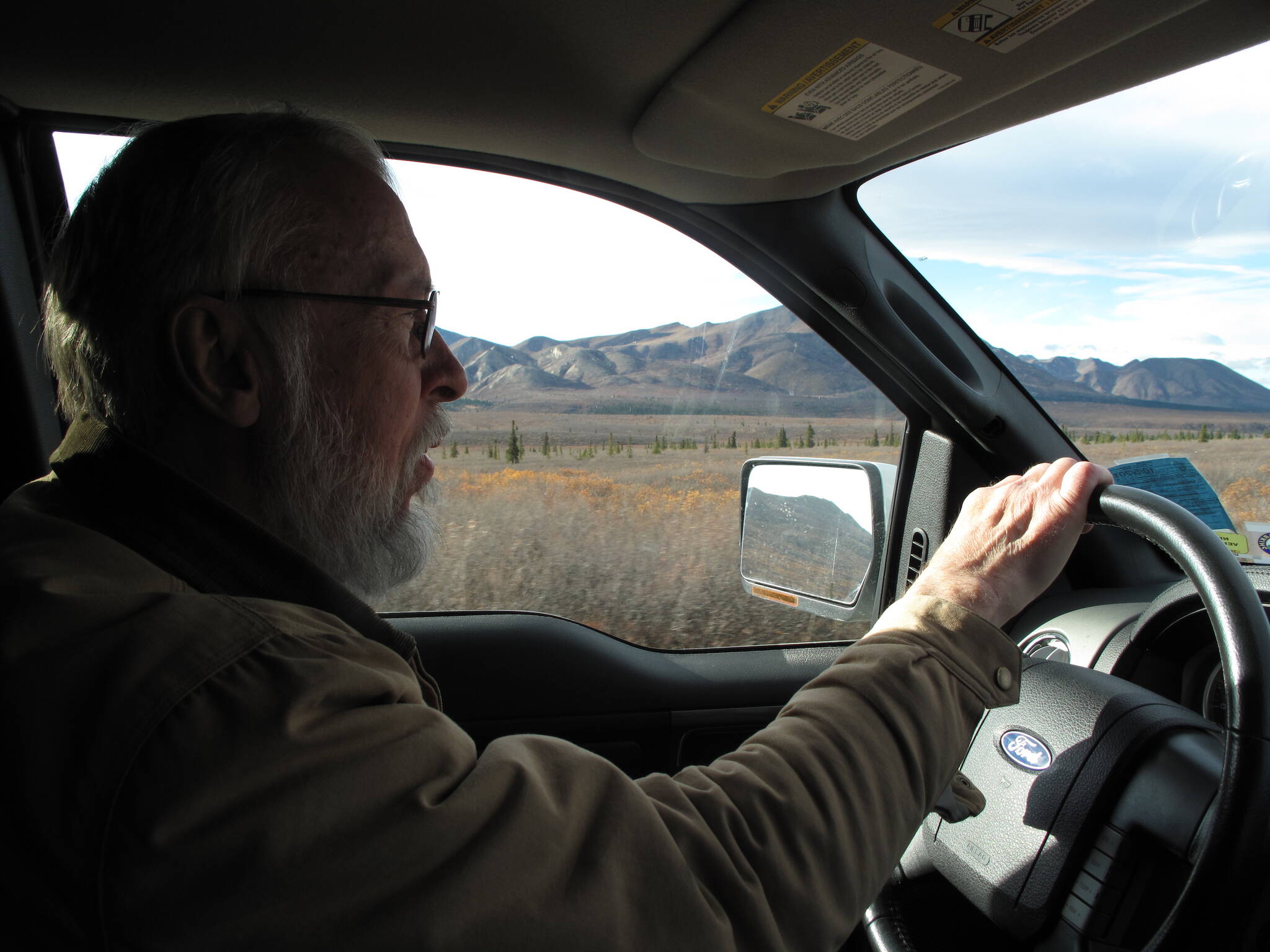 The late Vic Van Ballenberghe, who studied moose for decades, drives the Denali Park road in late September 2011. (Courtesy Photo / Ned Rozell)