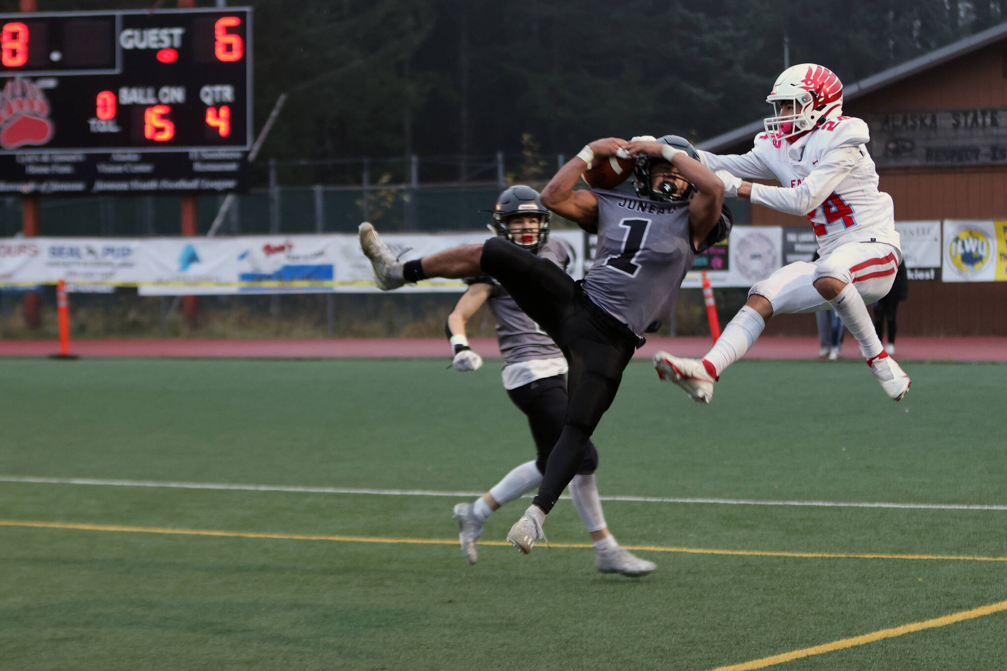 Jarrell Williams comes down with an interception in the end zone to put an end to an East scoring threat and the ball game. Williams had a big game on both sides of the ball in Juneau’s semi-finals victory against Bettye Davis East Anchorage High School.