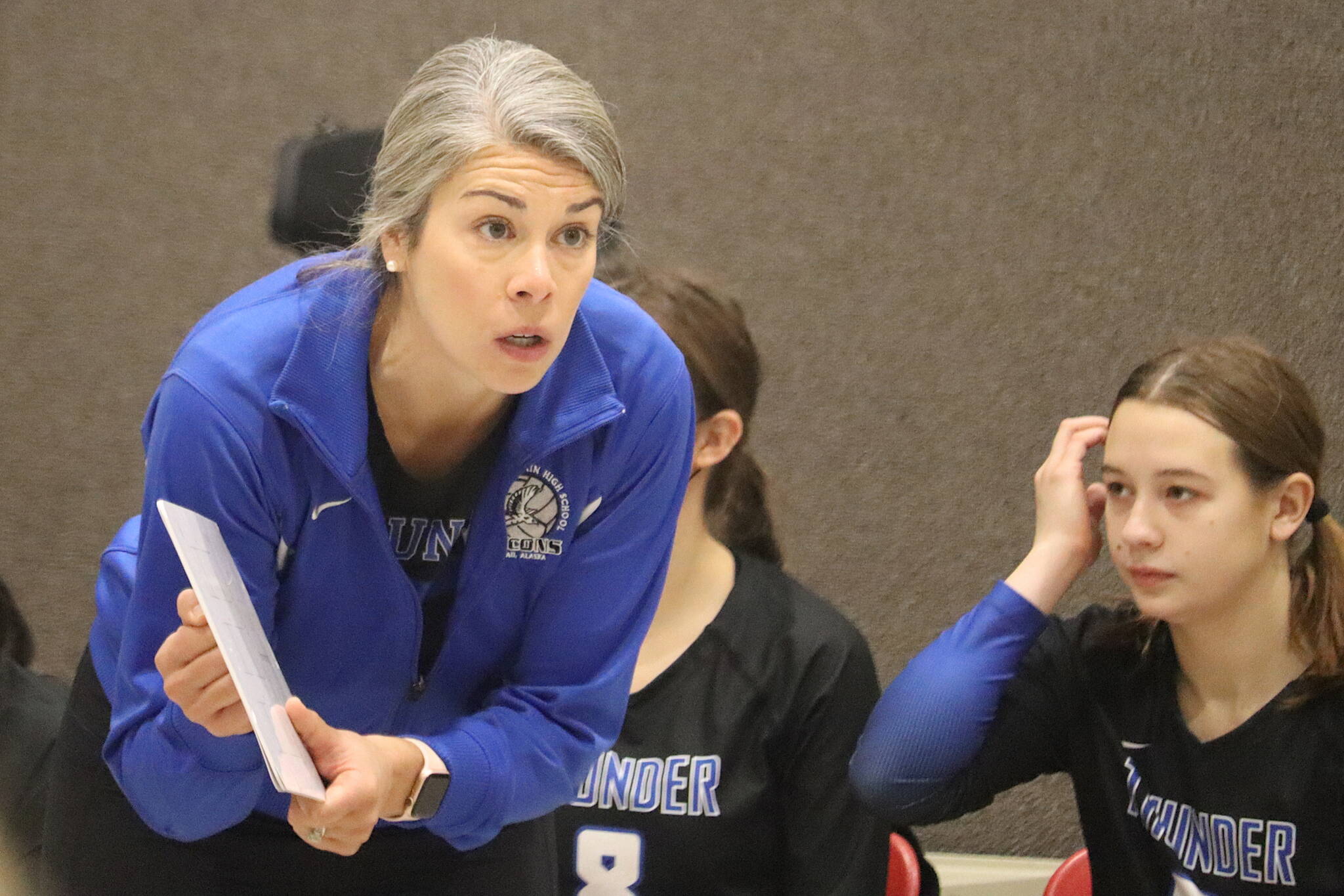 Thunder Mountain High School coach Julie Herman calls instructions to her team during a game Saturday morning to determine seeding in the Juneau Invitational Volleyball Extravaganza. TMHS earned the top seed, but finished second overall. (Mark Sabbatini / Juneau Empire)