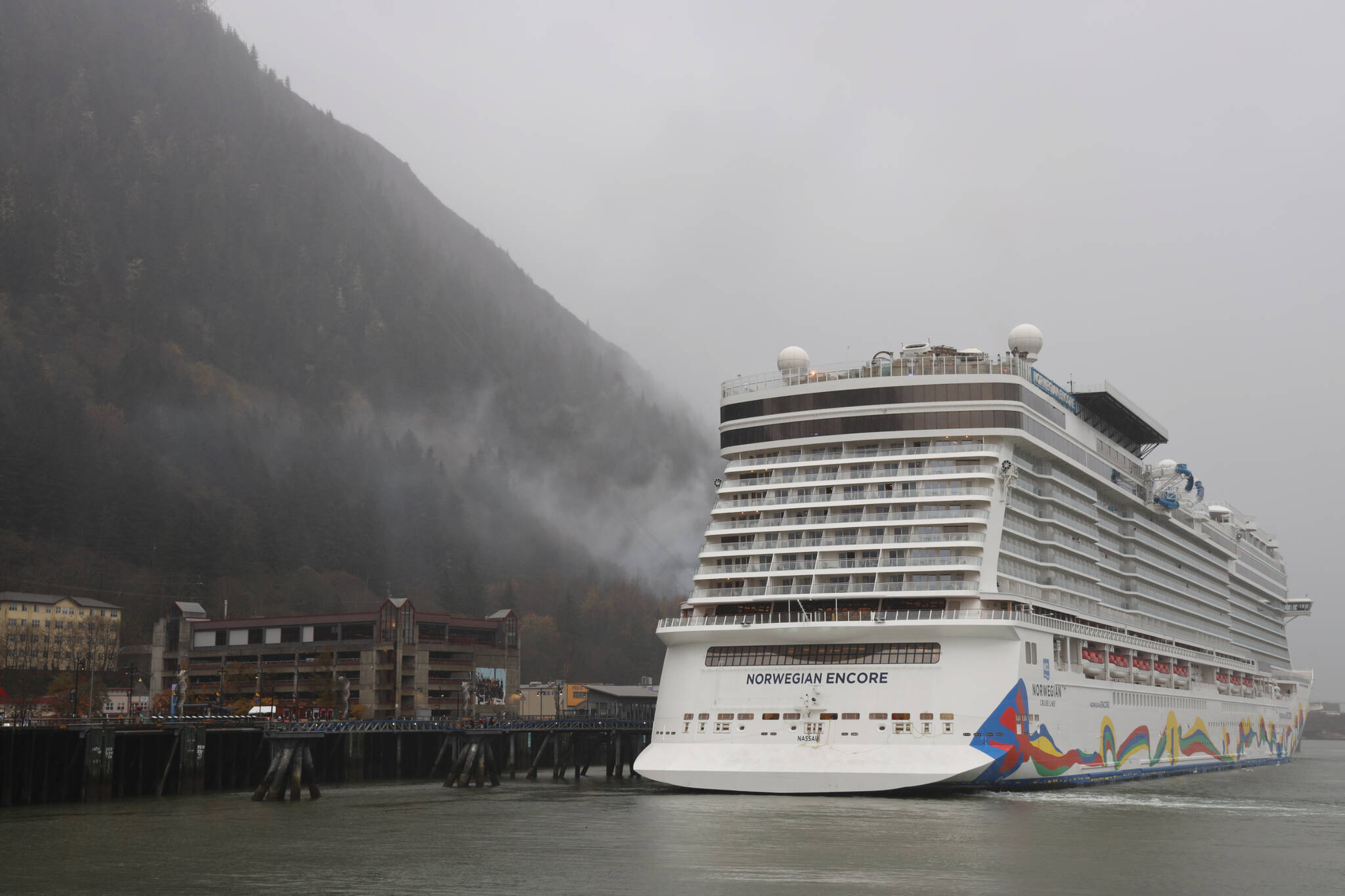 The final cruise ship, Norwegian Cruise Line’s Norwegian Encore, sailed out of Juneau Tuesday night marking the end of another tourism season that, according to officials, brought near pre-pandemic numbers of visitors to the capital city. (Clarise Larson / Juneau Empire)