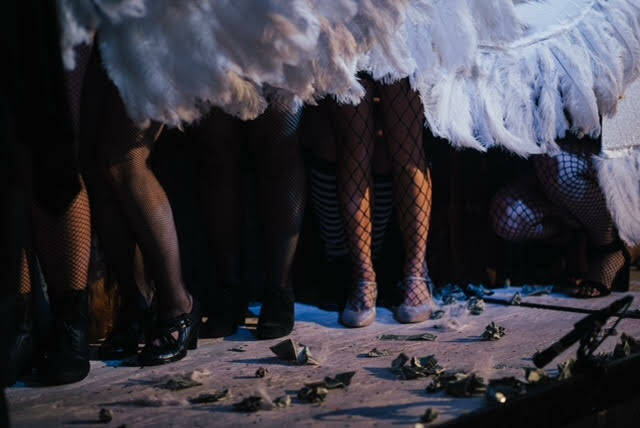 Performers stand in a line donning tutus and fishnet leggings at a previous Nude & Rude event. Taylor Vidic, stage and marketing manager at the Crystal Saloon and performer and producer a part of the show, said the show will feature an array of acts from nearly 20 performers under the umbrella of burlesque. (Courtesy/ Sydney Akagi)
