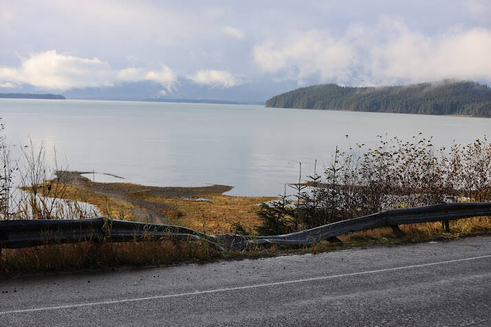 A portion of the guardrail along Glacier Highway near the Auke Bay Ferry Terminal is bent down after a dump truck crashed through it Thursday afternoon. (Clarise Larson / Juneau Empire)