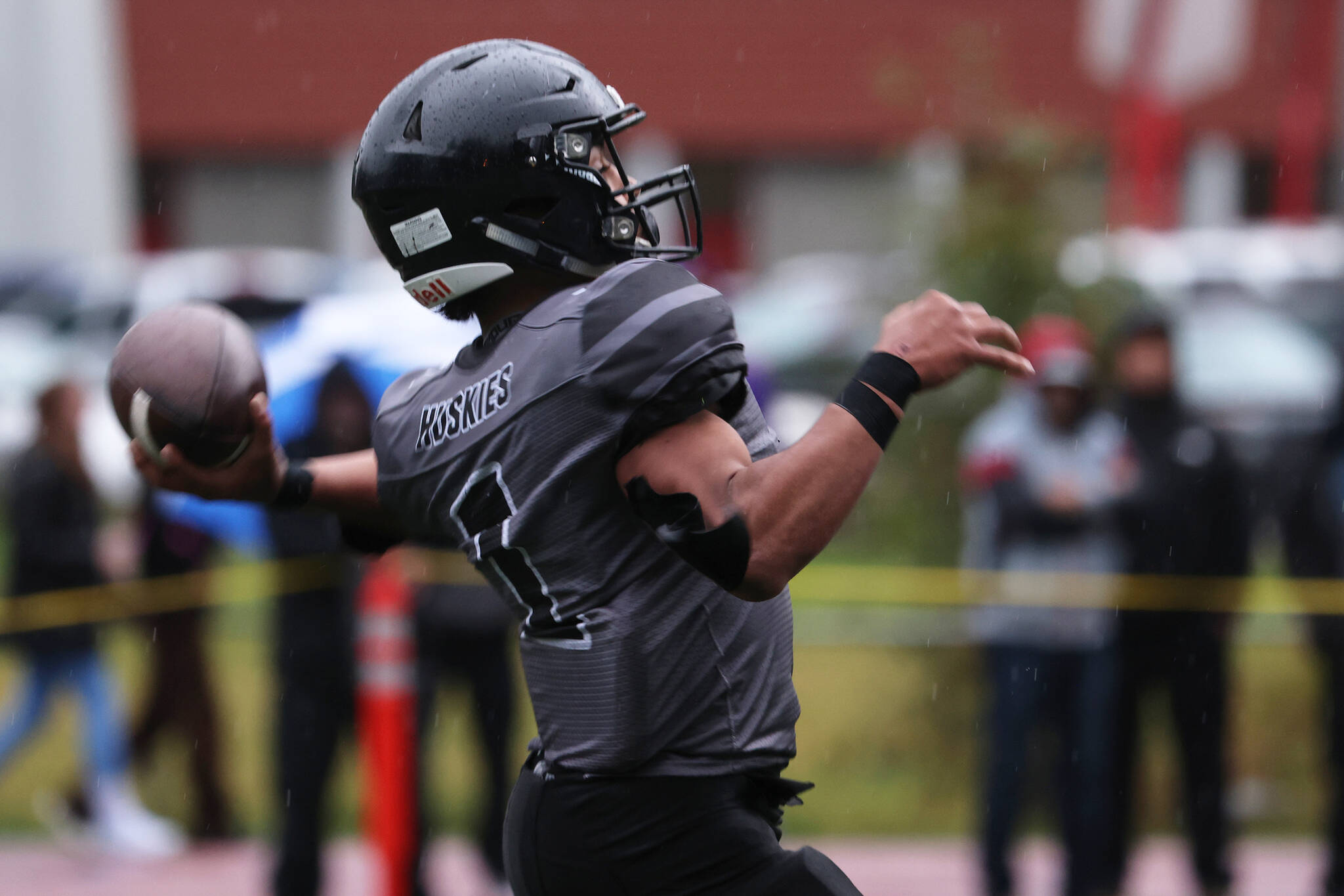Jarrell Williams winds up for a long throw. Williams could be a difference-maker for Juneau in the state championship game. (Ben Hohenstatt / Juneau Empire)