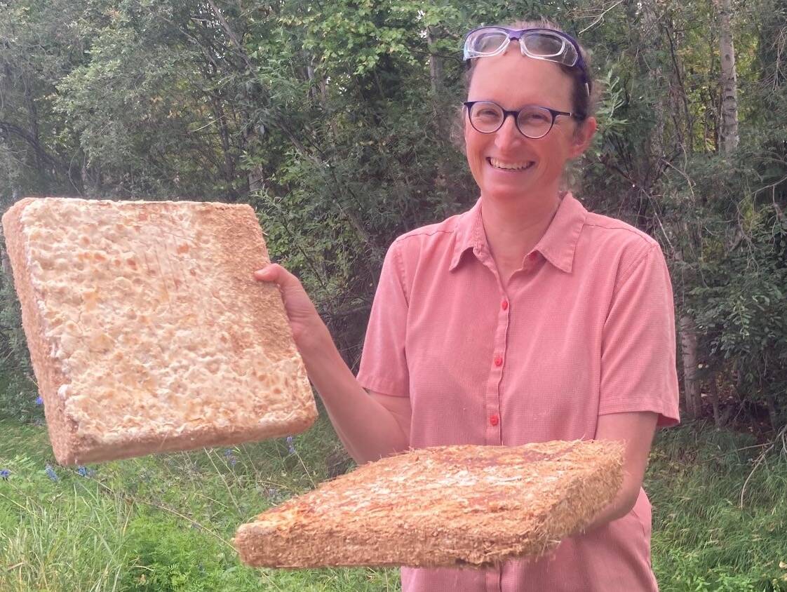 Engineer Robbin Garber Slaght holds prototype wood-fibre insulation boards held together by a species of fungus.  (Courtesy of Molly Rettig)