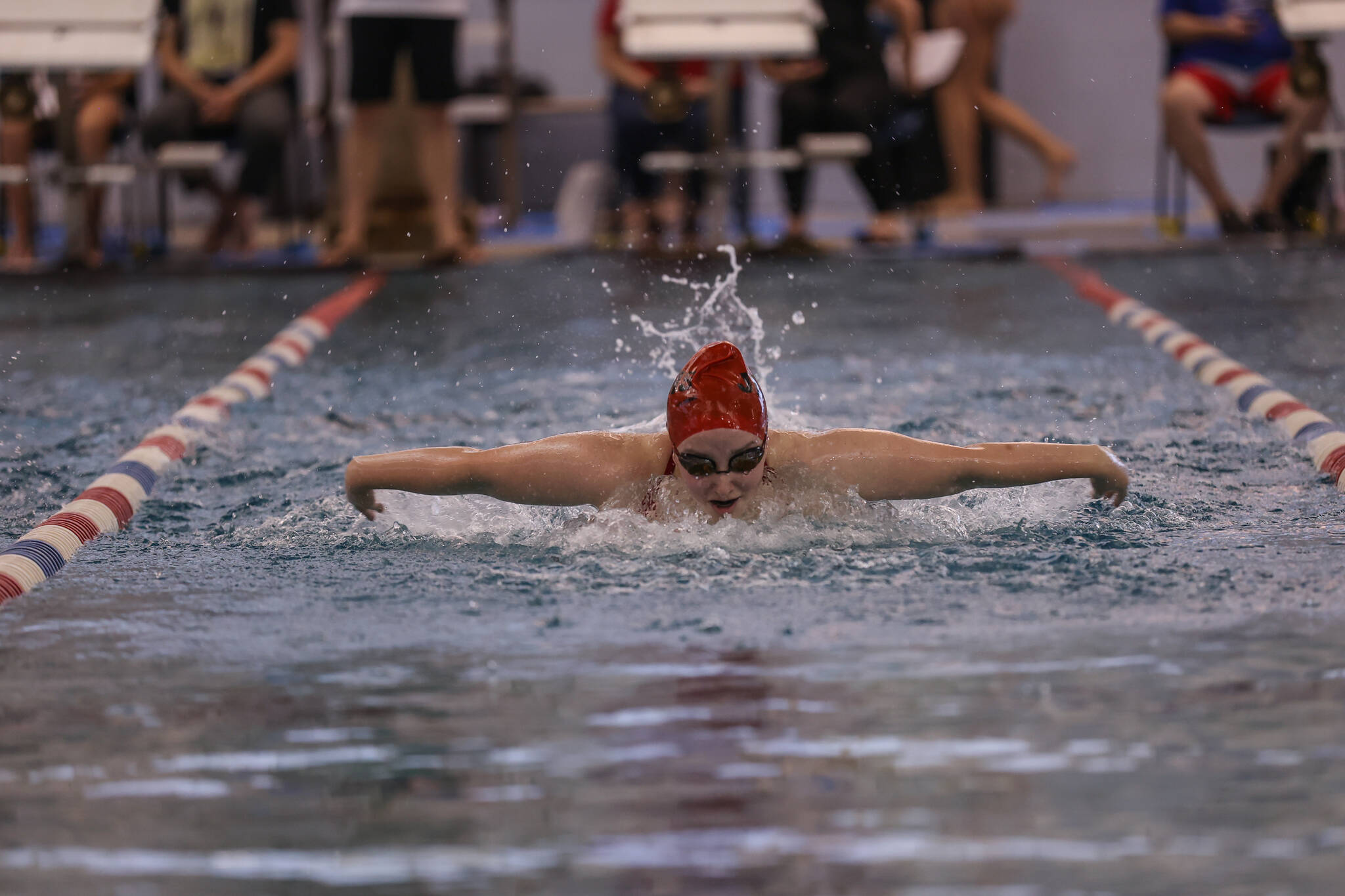 JDHS junior and girl’s team captain Emily Delgado featured in this photo swimming the butterfly stroke at a JDHS/TMHS Dual Meet on August 26. (Courtesy Photo / Phil Loseby)