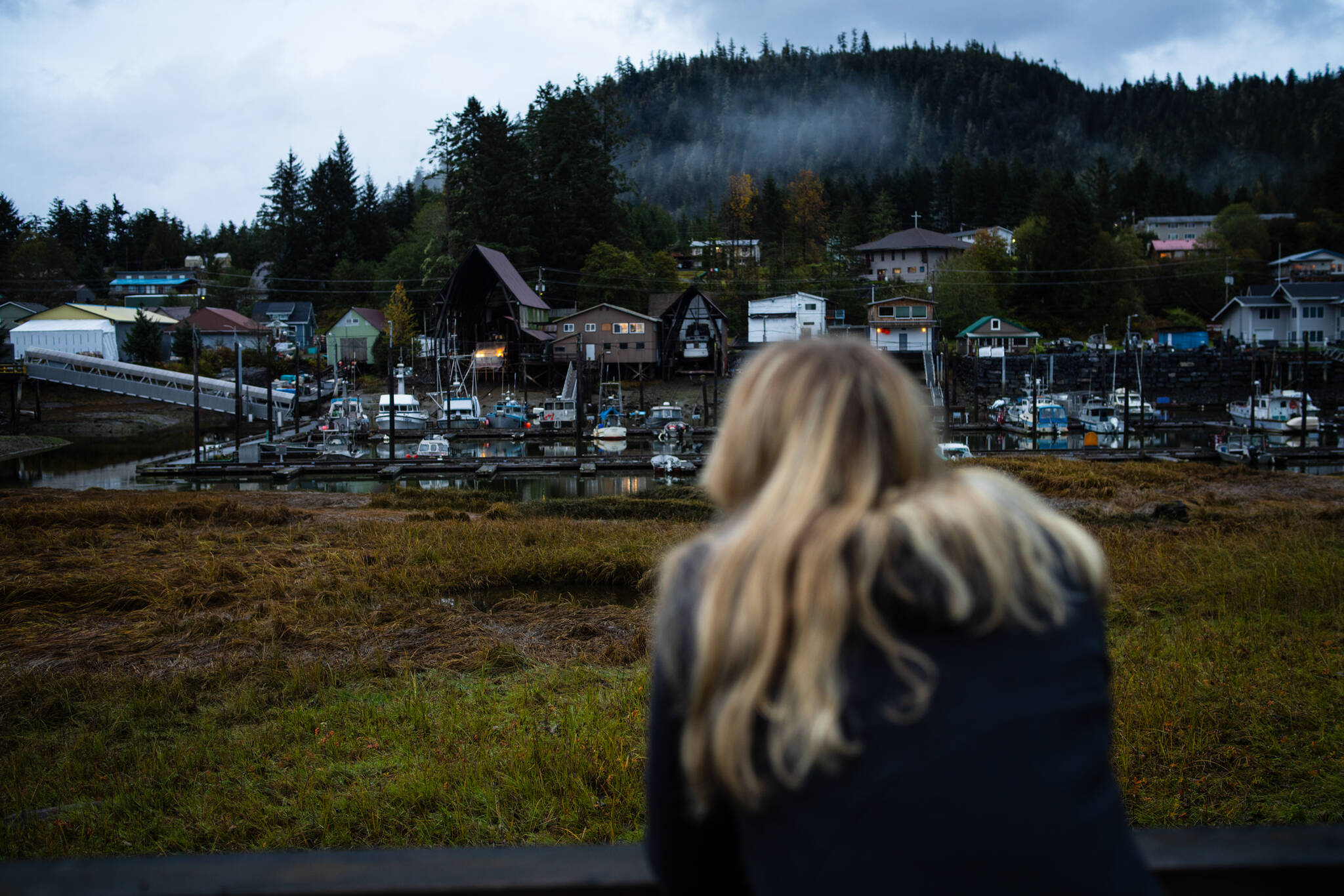 Mia, the author, looks out on her hometown of Wrangell Ḵaachx̱aana.áakʼw. (Bethany Sonsini Goodrich / Sustainable Southeast Partnership)