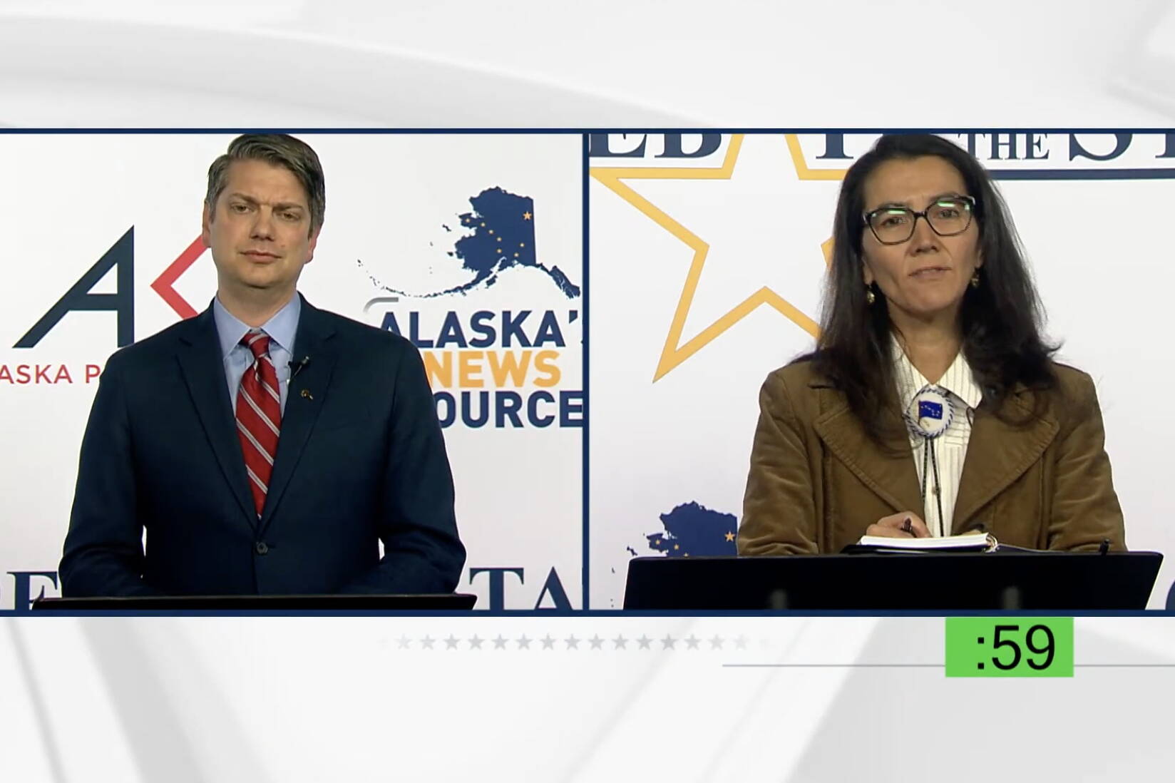 Screenshot 
Republican Nick Begich, left, challenges Democratic U.S. Rep. Mary Peltola about her retaining much of former Rep. Don Young’s staff during a statewide televised debate Wednesday.