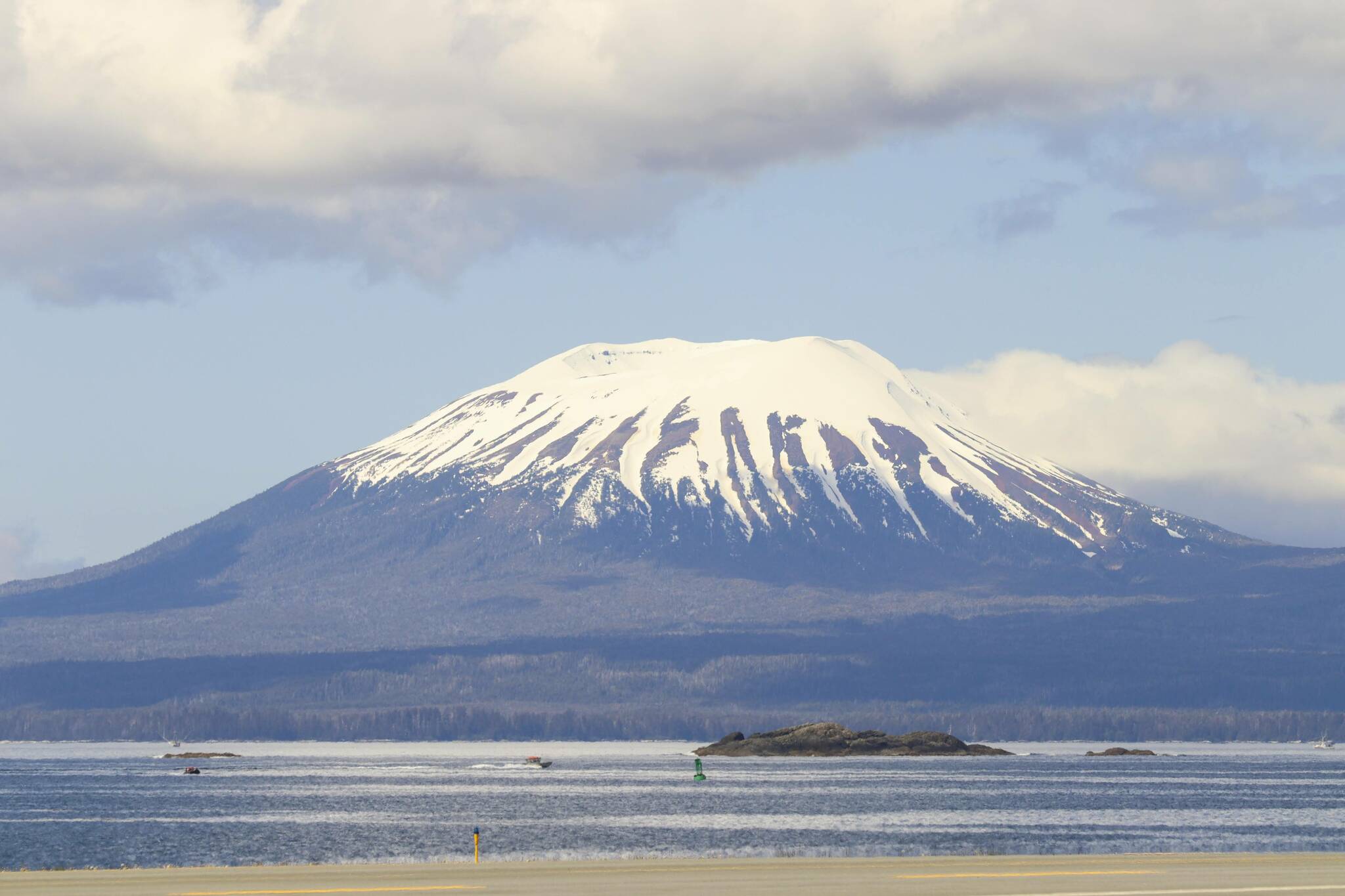 This May photo shows Mount Edgecumbe on a relatively clear day. New research has shed new light on magma activity underneath the “historically active” volcano. (Michael S. Lockett / Juneau Empire)