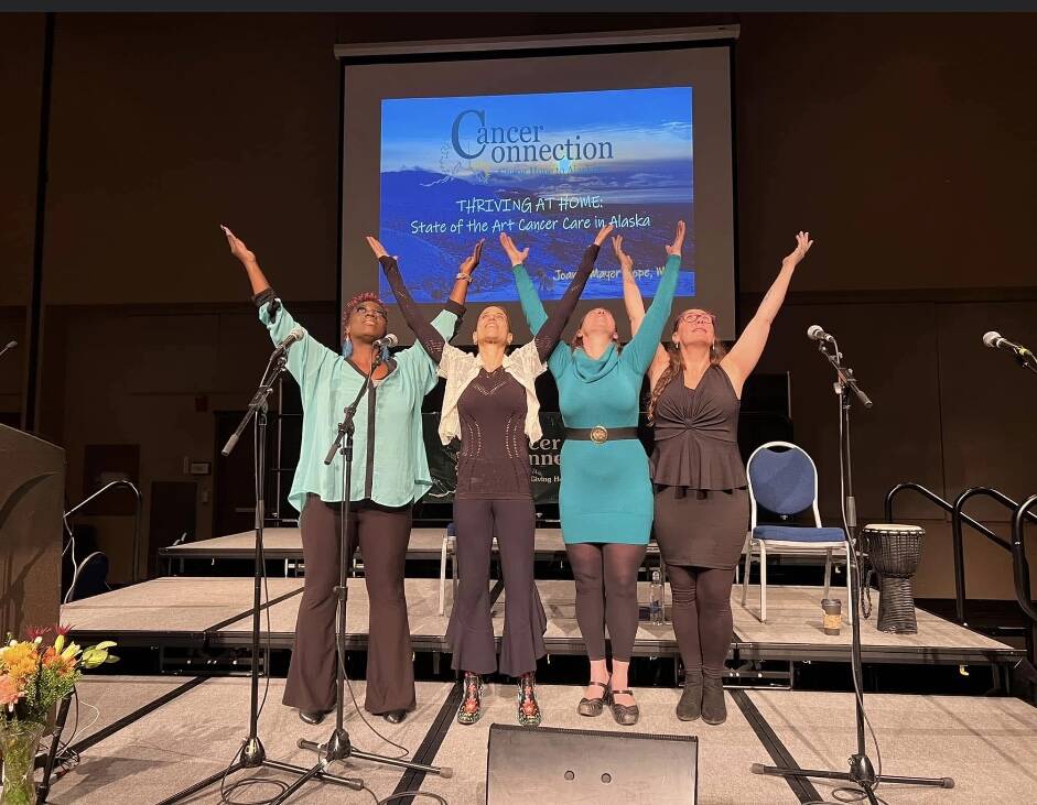 Dr. Joanie Mayer Hope and her band (Any Mountain Campfire) with professional vocalist, Melissa Mitchell, Misha Baskerville and Kat Moore, singing original inspirational songs at the Cancer Connection Community Health Forum held on Oct. 29 at Centennial Hall. (Courtesy Photo)