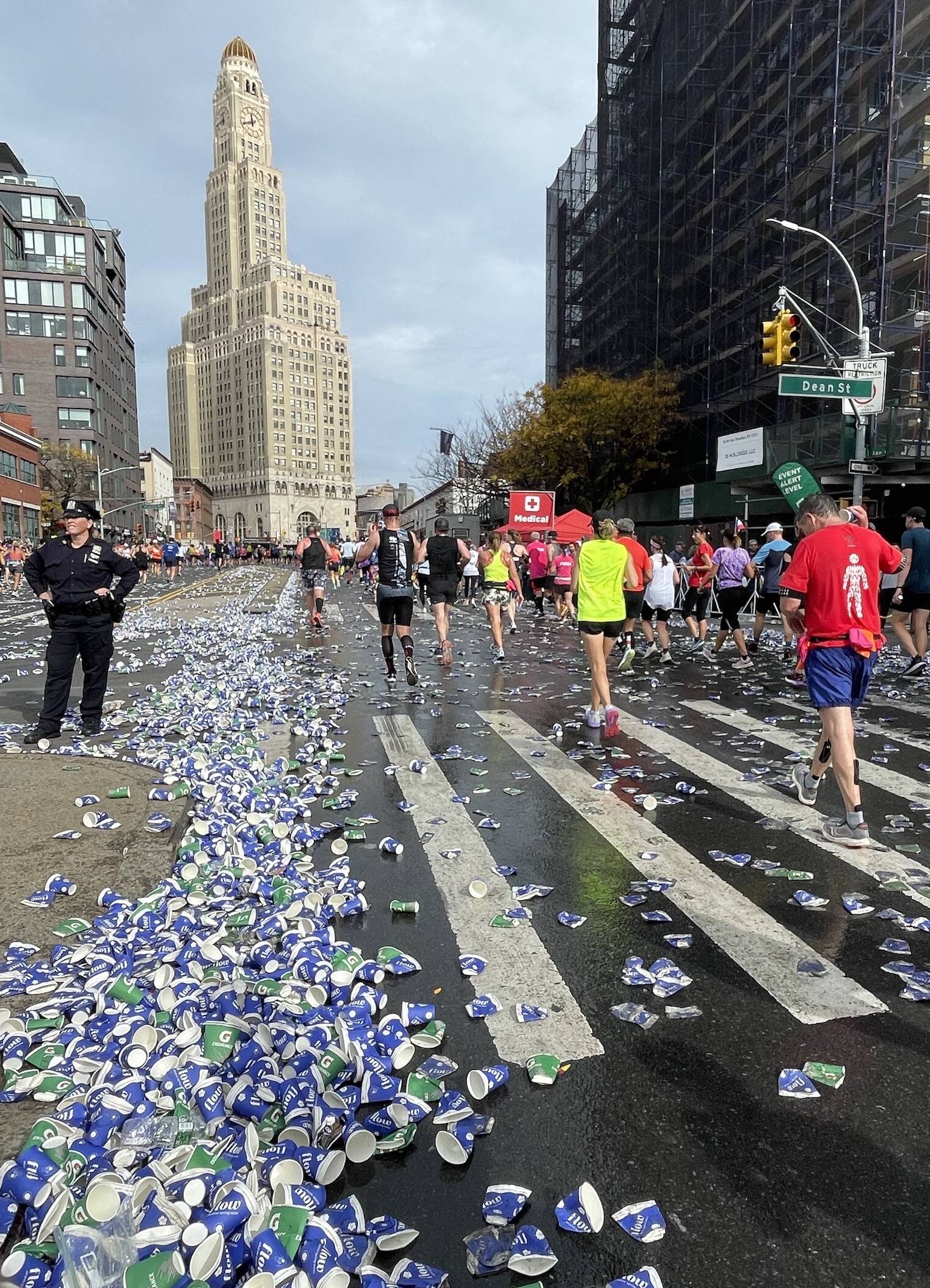 Cups that held sports drinks and water pile up on a Brooklyn Street during the New York City Marathon on Nov. 6, 2022. (Courtesy Photo / Ned Rozell)