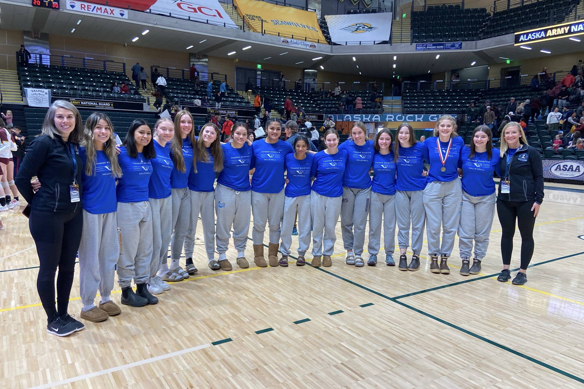 The 2022-23 Thunder Mountain girls varsity volleyball team poses for a group photo during 2022 3A/4A Volleyball State Championships in Anchorage on Thursday and Friday, Nov. 10 and 11. (Courtesy Photo / Julie Herman)