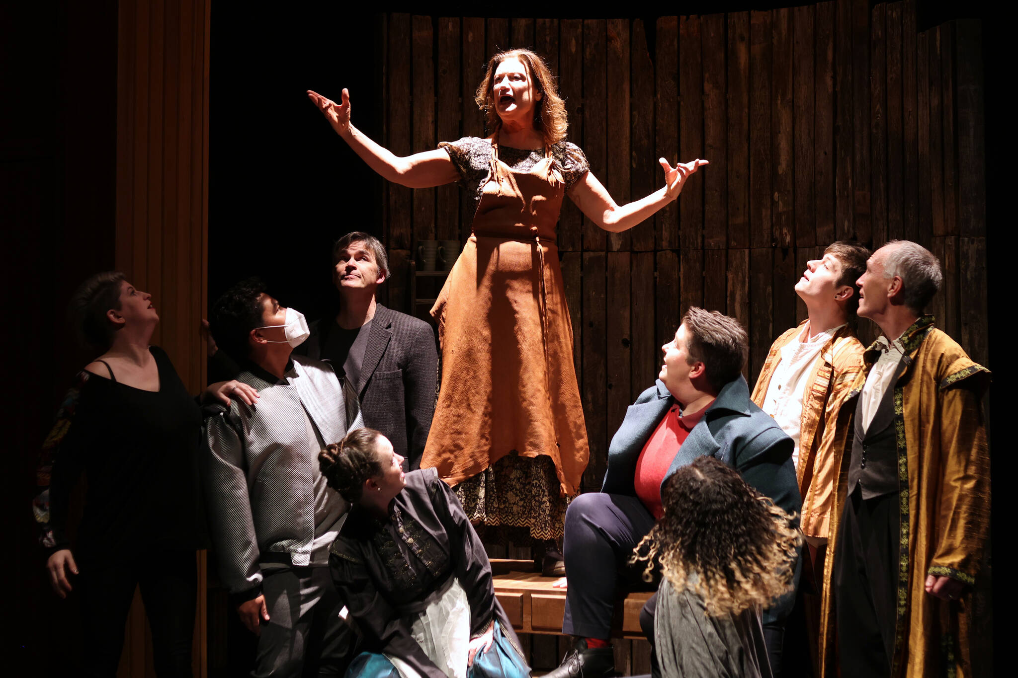 The cast of Theatre in the Rough’s production of “Witch” finishes off an unexpected musical number with flourish. From left to right: Stacy Katasse, Ty Yamoaka, Aaron Elmore, Katie Jensen, Cate Ross, Kelsey Riker, Salissa Thole, Dakota Morgan and Patrick Minik. The local company’s production of the play includes a few musical moments unique to the Juneau effort. Below, Scratch (Kelsey Riker) enters a scene with a devilish grin during rehearsal.