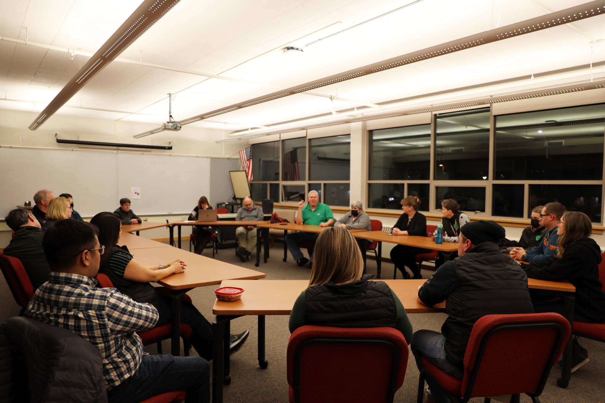 Members of Juneau Board of Education and Juneau Education Association meet to talk at the pair’s annual meet and greet Tuesday night. (Clarise Larson / Juneau Empire)