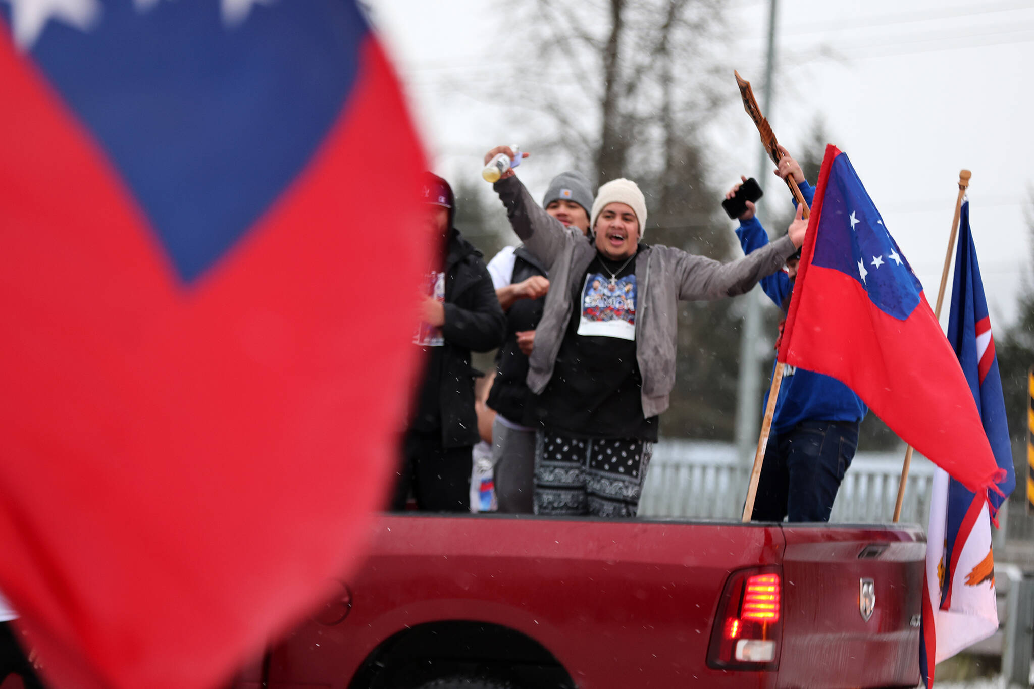Rugby fans celebrate Samoa’s Rugby League World Cup run that ended Saturday with a loss to Australia in the finals. (Ben Hohenstatt / Juneau Empire)