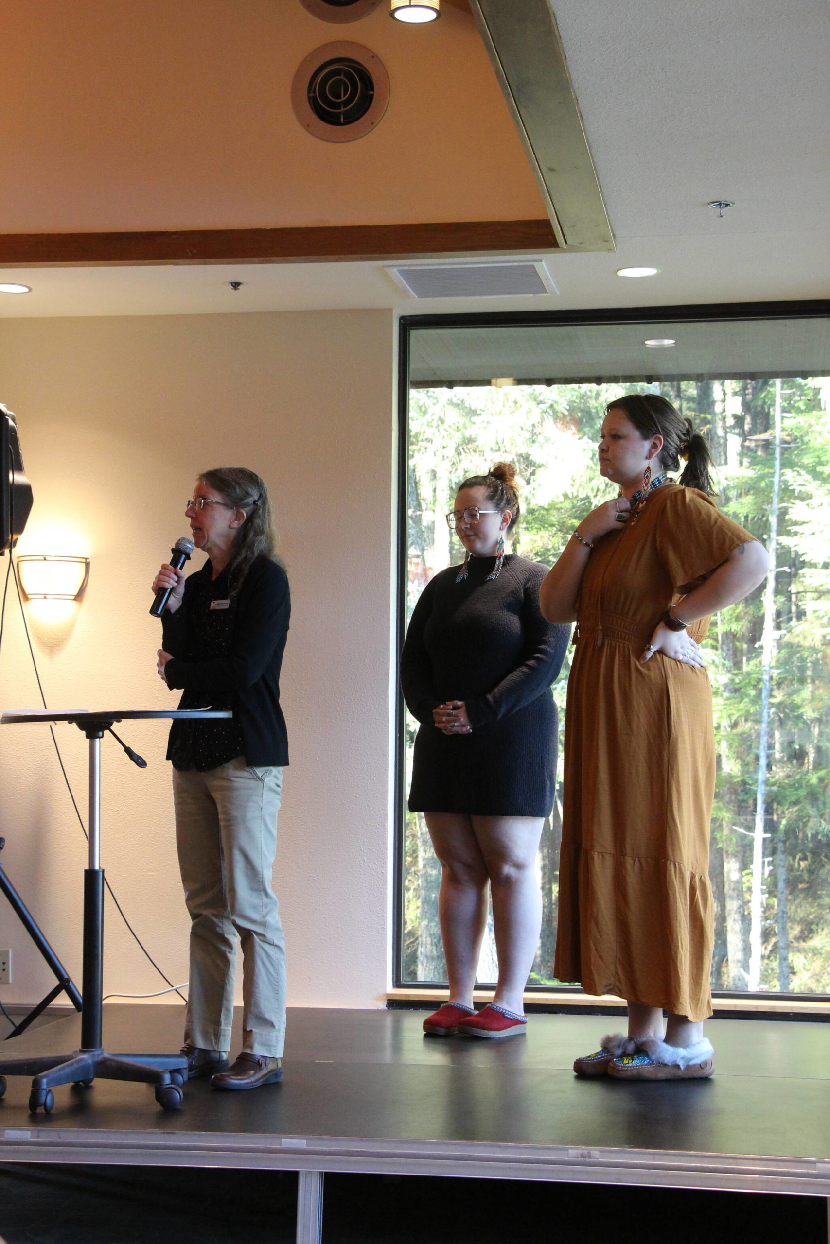 Kaia Henrickson, an information literacy librarian and assistant professor of library and information science, addresses the history of Thanksgiving alongside Selah Judge and Almaria Alcantra. (Courtesy Photo / Shaelene Grace Moler)
