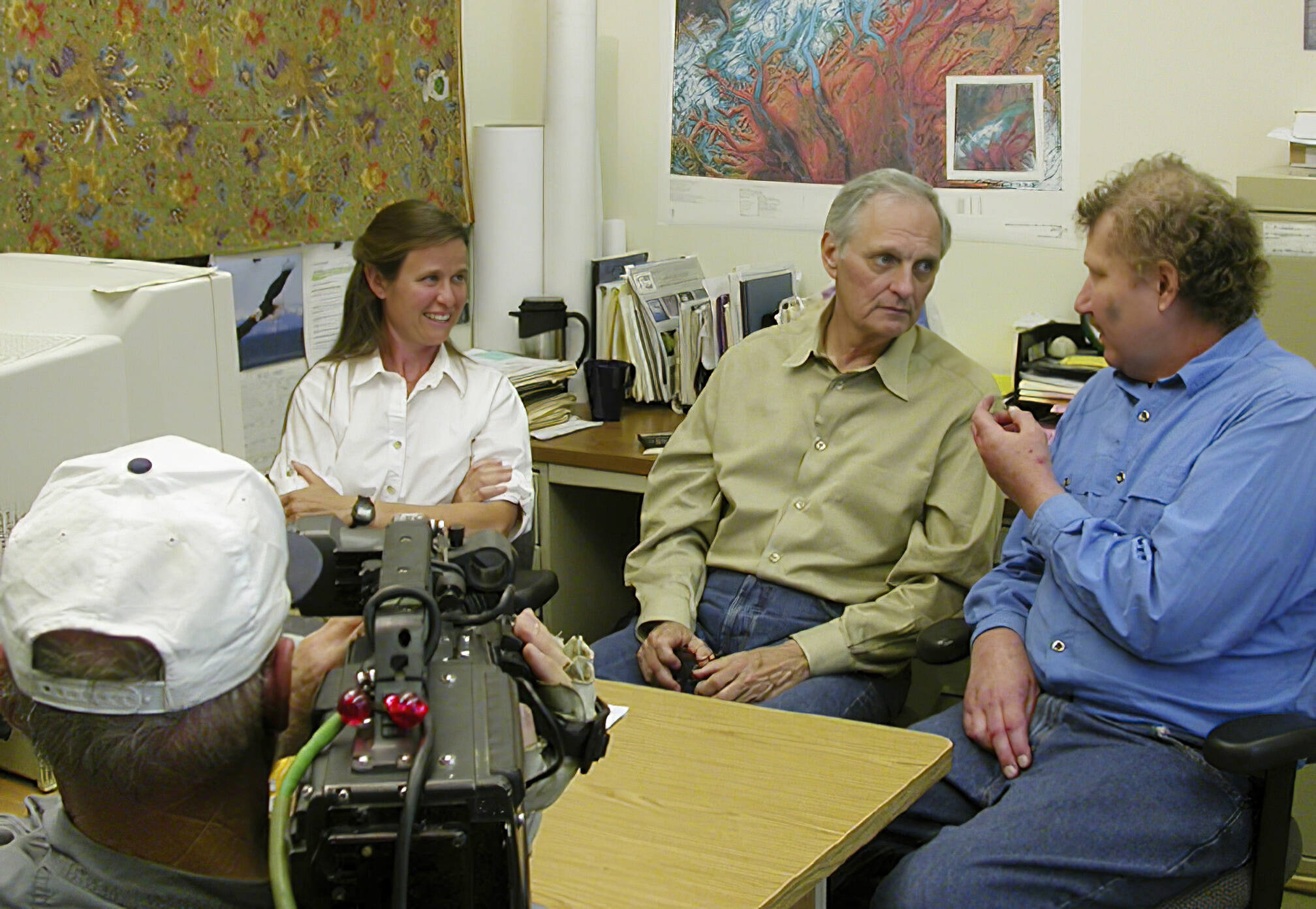 Alan Alda, center, was host of PBS’s “Scientific American Frontiers” when he visited Alaska in 2004. To his right is By Valentine, who worked in the glaciers lab at the Geophysical Institute with glaciologist Keith Echelmeyer (on Alda’s left). Echelmeyer died of brain cancer six years after Alda’s visit. (Courtesy Photo / Ned Rozell, enhanced 18 years later by JR Ancheta)