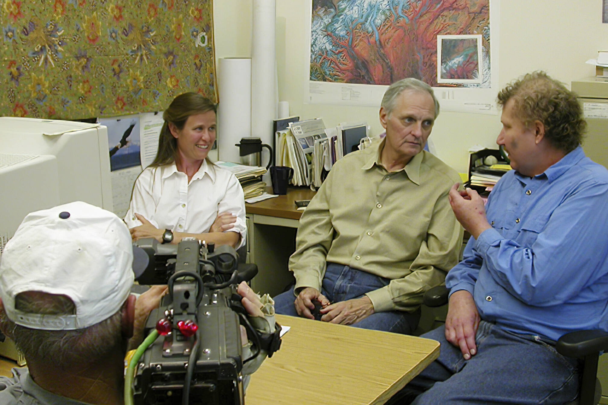 Alan Alda, center, was host of PBS’s “Scientific American Frontiers” when he visited Alaska in 2004. To his right is By Valentine, who worked in the glaciers lab at the Geophysical Institute with glaciologist Keith Echelmeyer (on Alda’s left). Echelmeyer died of brain cancer six years after Alda’s visit. (Courtesy Photo / Ned Rozell, enhanced 18 years later by JR Ancheta)