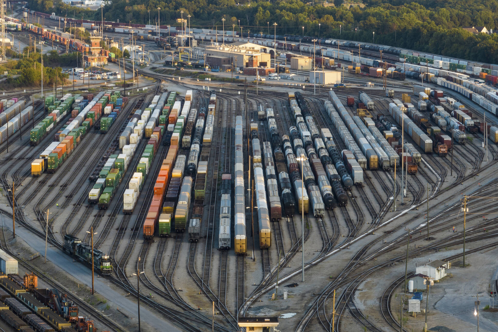 FILE - Freight train cars sit in a Norfolk Southern rail yard on Sept. 14, 2022, in Atlanta. The Biden administration is saying the U.S. economy would face a severe economic shock if senators don't pass legislation this week to avert a rail worker strike. The administration is delivering that message personally to Democratic senators in a closed-door session Thursday, Dec. 1.  (AP Photo / Danny Karnik)