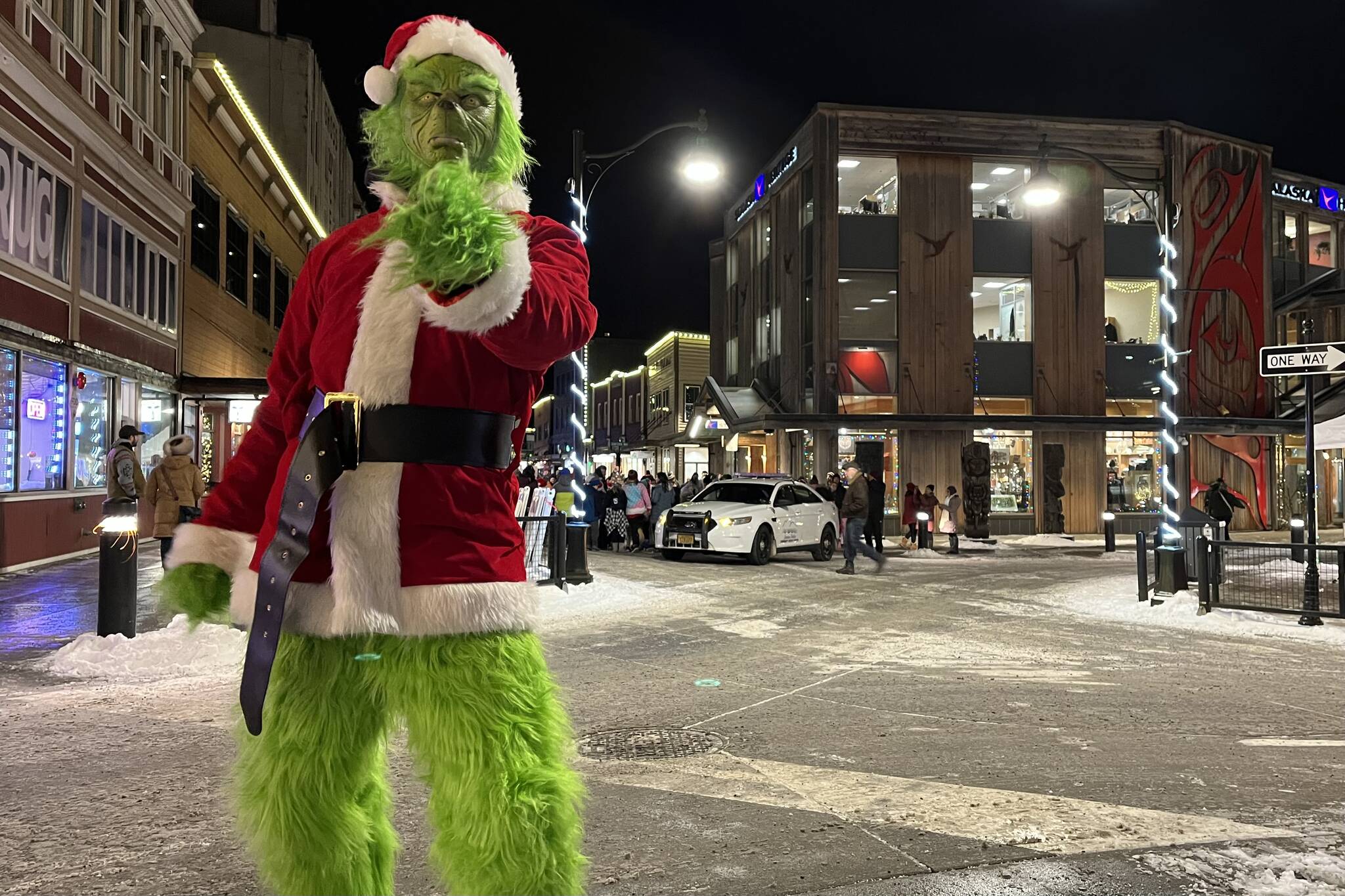 Even the Grinch got into the holiday spirit at Juneau’s Gallery Walk 2022 on Friday. (Jonson Kuhn / Juneau Empire)