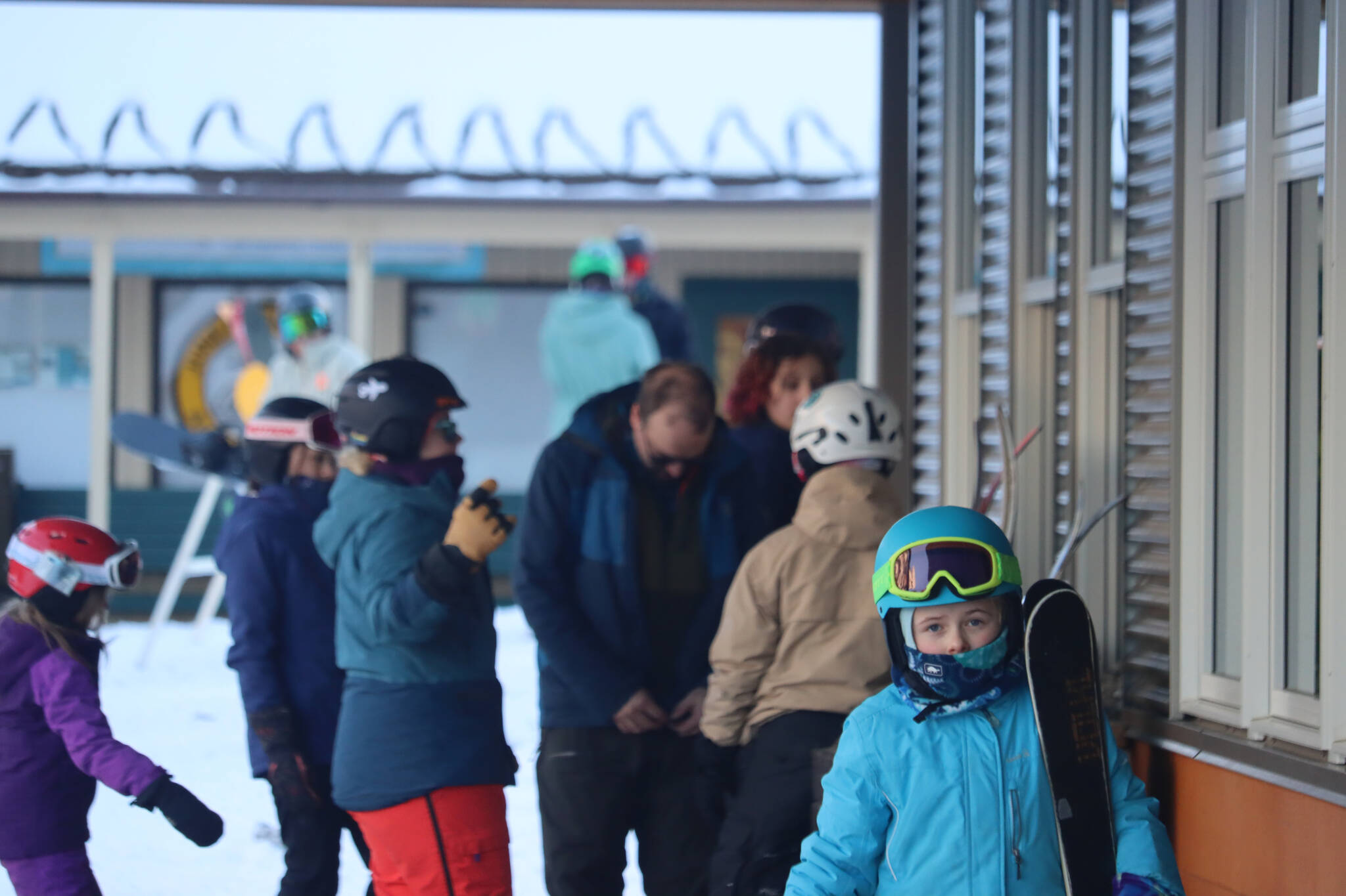 Juneau crowds flock to Eaglecrest Ski Area on Saturday to enjoy the official opening of the ski season. The mountain was limited to only utilizing the Porcupine Chairlift, but additional lifts are expected to open in the coming months, according to staff. (Jonson Kuhn / Juneau Empire)