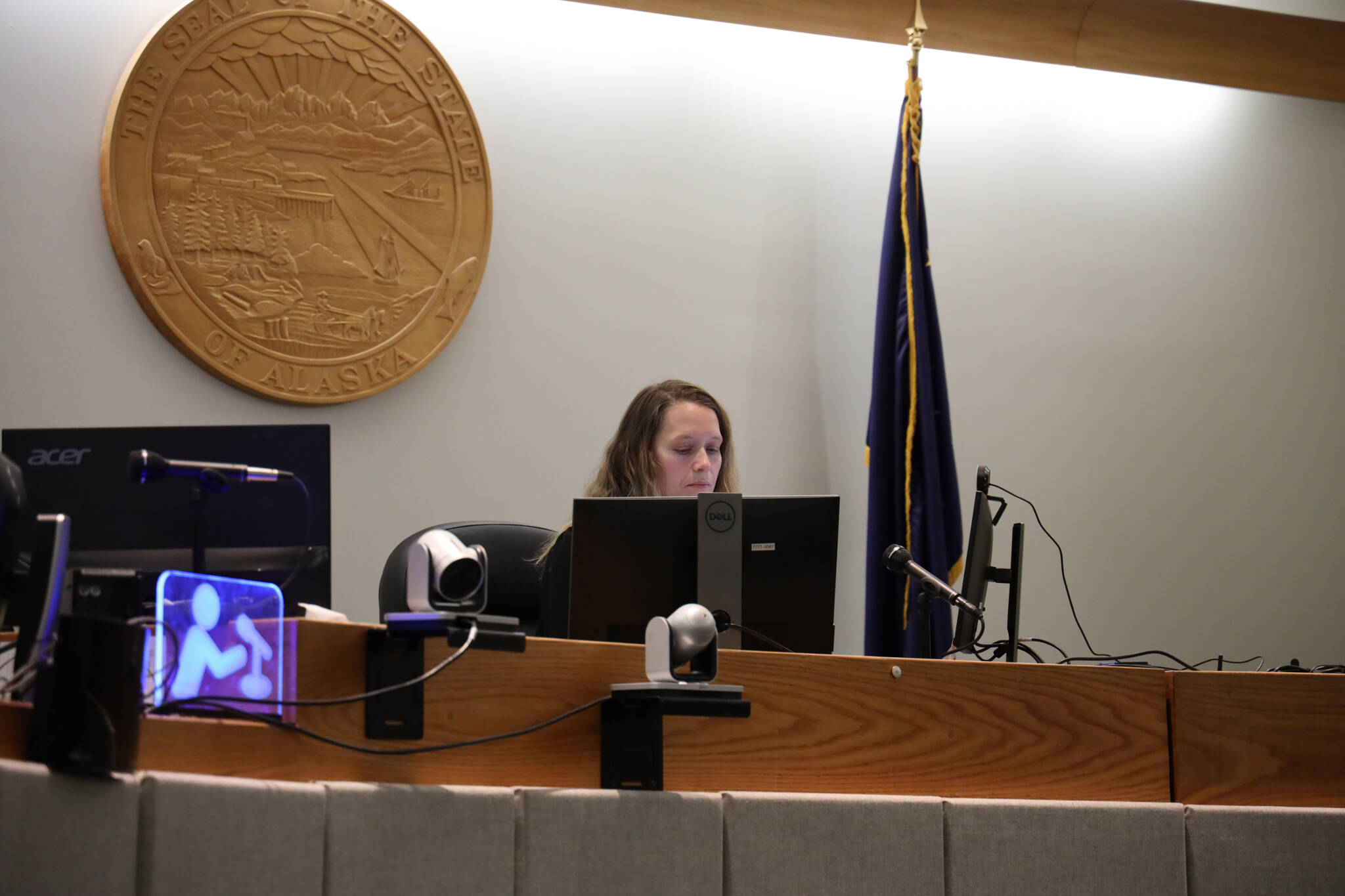 Judge Marianna Carpeneti presides Tuesday in the arraignment hearing for Anthony Michael Migliaccio who was arrested in November on charges in the killing of Faith Rogers. Migliaccio called in for the hearing via phone call from Lemon Creek Correctional Center. (Clarise Larson / Juneau Empire)