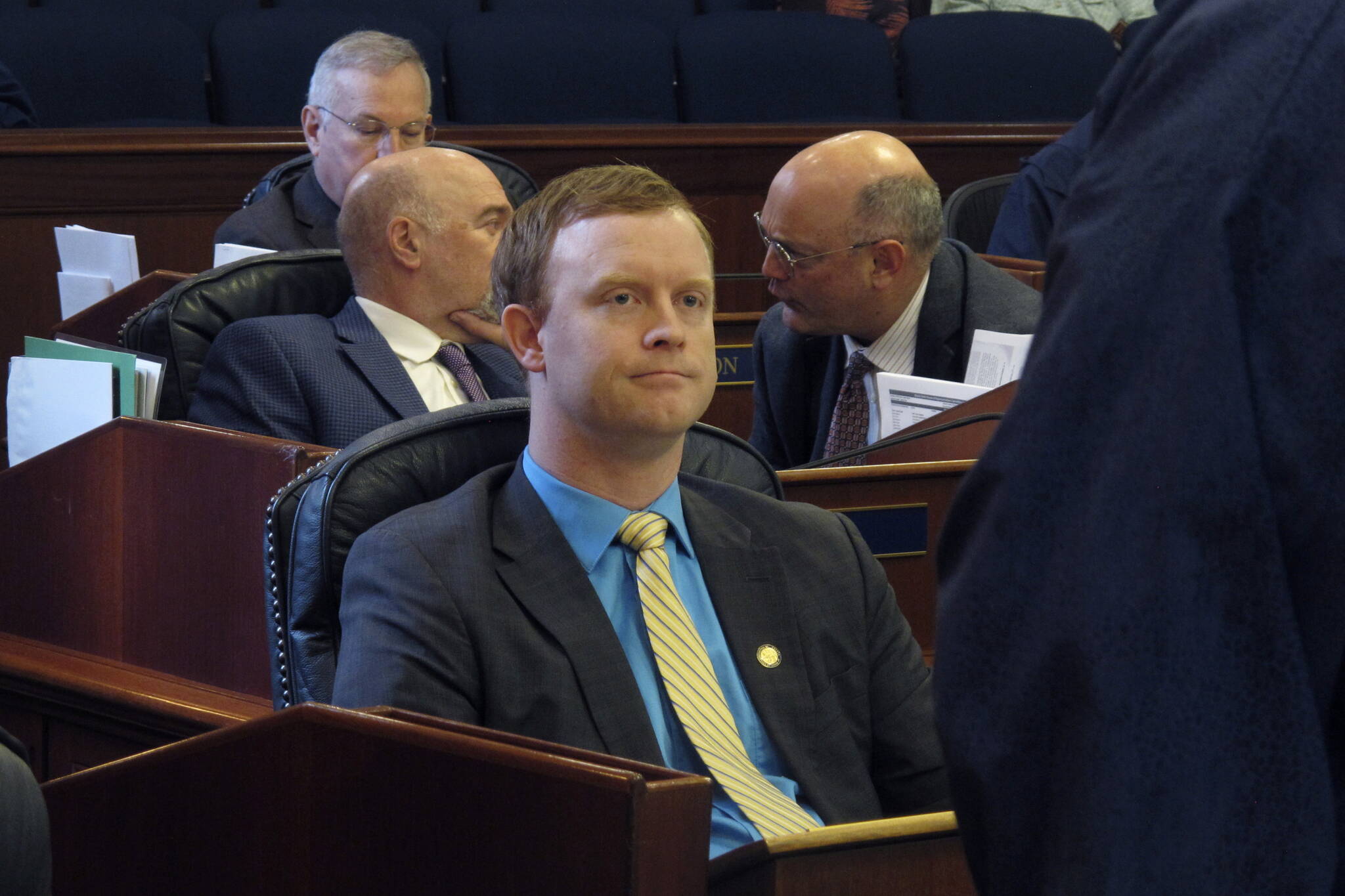 Alaska State Rep. David Eastman, a Wasilla Republican, is shown seated on the House floor on April 29 in Juneau. His district seat is among those whose fate is unknown, due to a pending lawsuit challenging his eligibility because of his membership in Proud Boys. (AP Photo/Becky Bohrer, File)