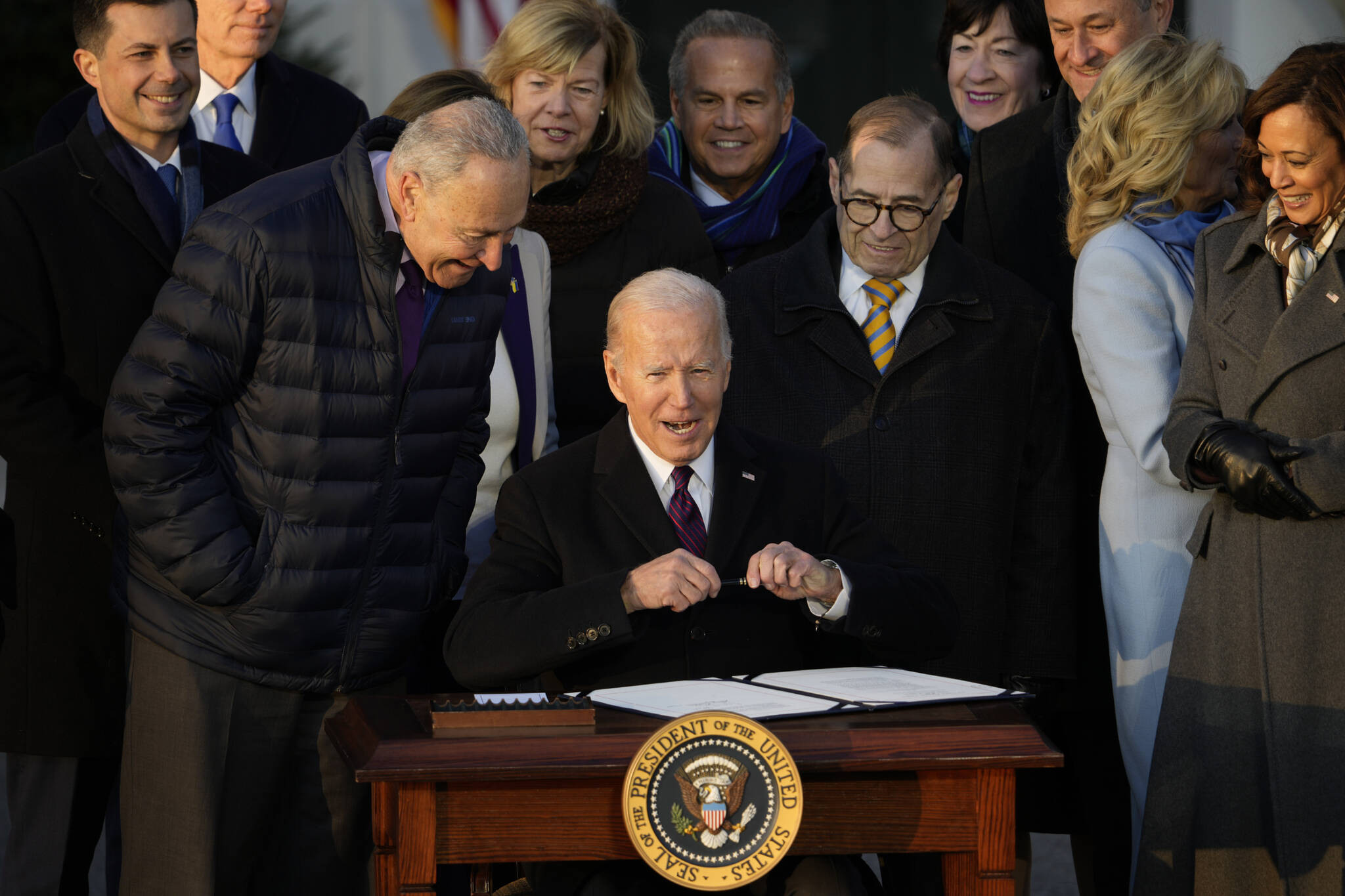 President Joe Biden signs the Respect for Marriage Act, Tuesday, Dec. 13, 2022, on the South Lawn of the White House in Washington. (AP Photo / Andrew Harnik)