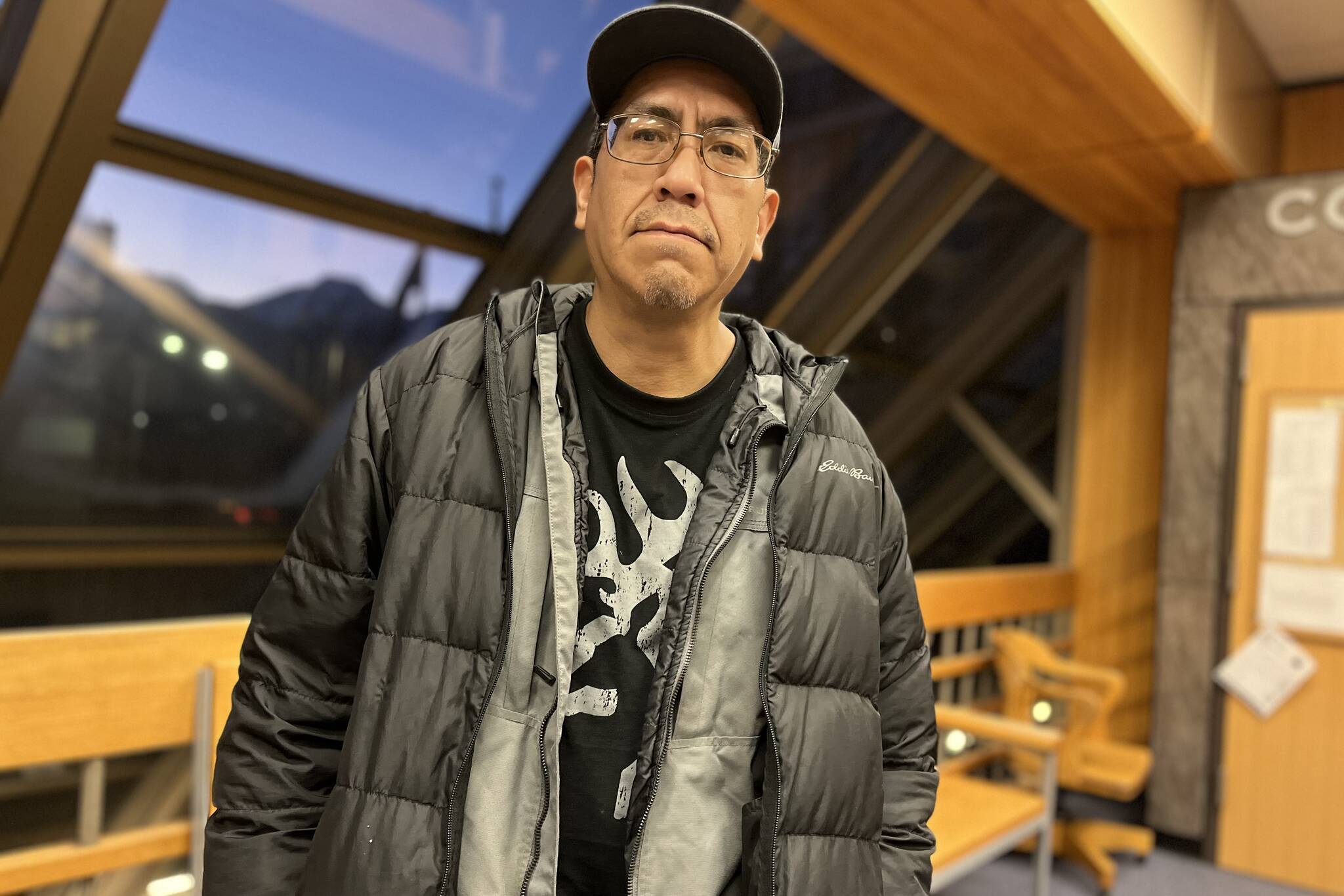 Alfred Torres stands in the lobby on Friday after hearing the judges decision to uphold Ronald Smith’s 70-year prison sentence. Smith was charged for the murder of Kenneth Thomas and assault on Torres in 2001, but due to appeals the case has been retried twice. (Jonson Kuhn / Juneau Empire)
