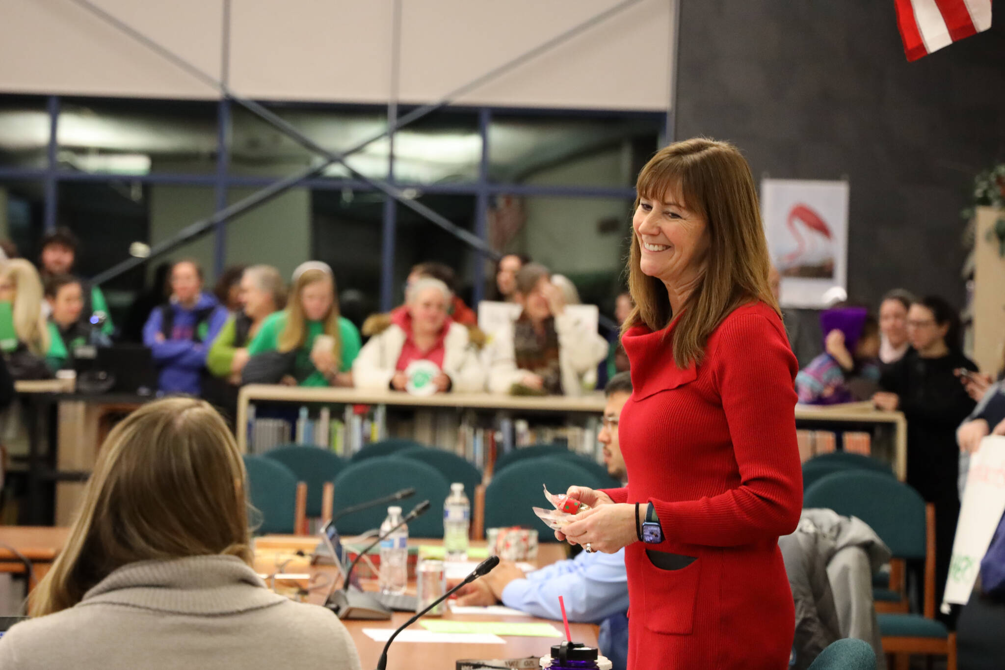 Outgoing Juneau School District Superintendent Bridget Weiss smiles during a school board meeting in early December. Tuesday afternoon, the Board of Education approved a contract to search for her replacement. (Clarise Larson / Juneau Empire)