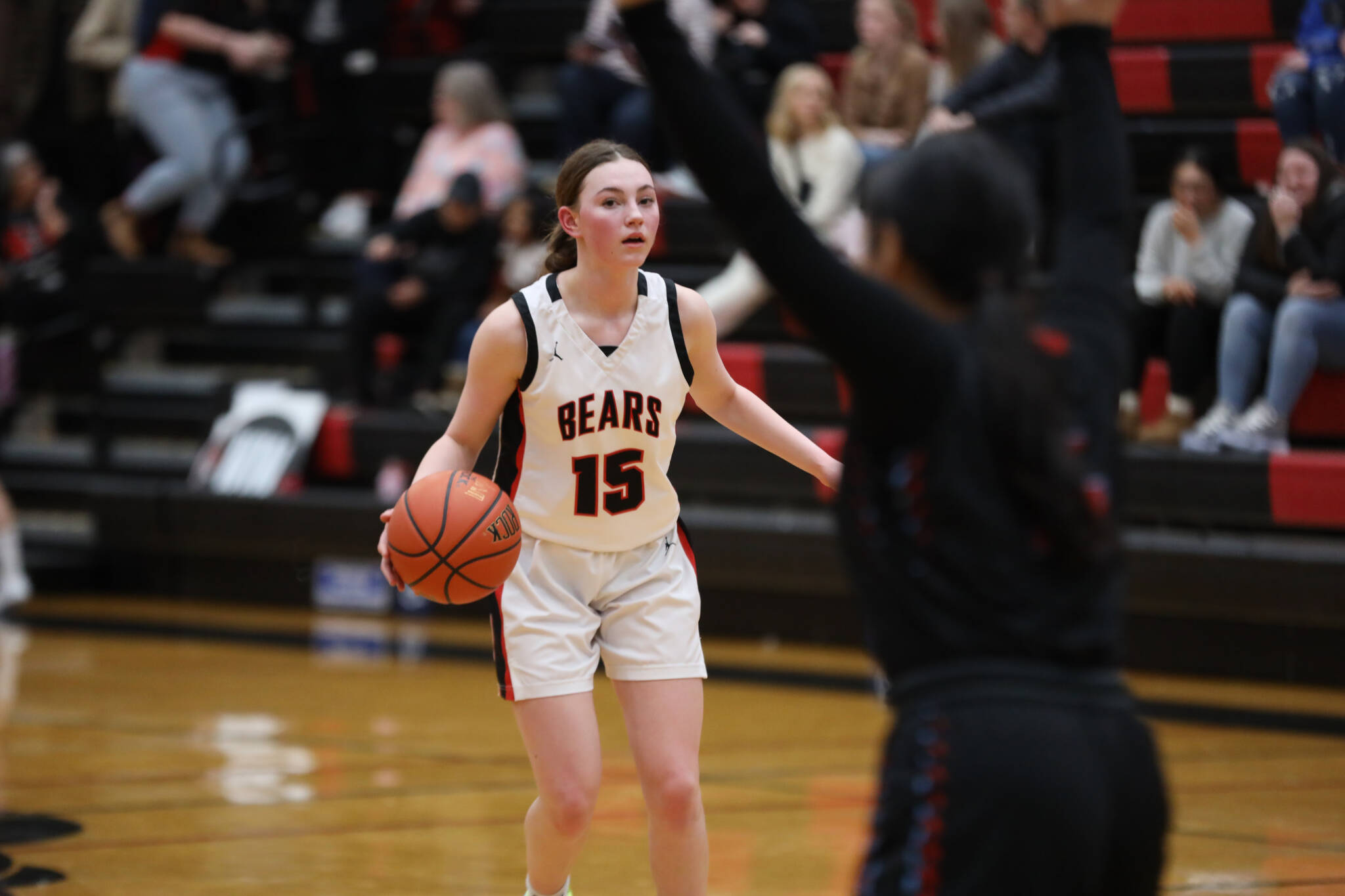 Freshman point guard Gwen Nizich scans the court during Wednesday night’s game against Bettye Davis East Anchorage High School during the first night of the Princess Cruises Capital City Classic. (Clarise Larson / Juneau Empire)