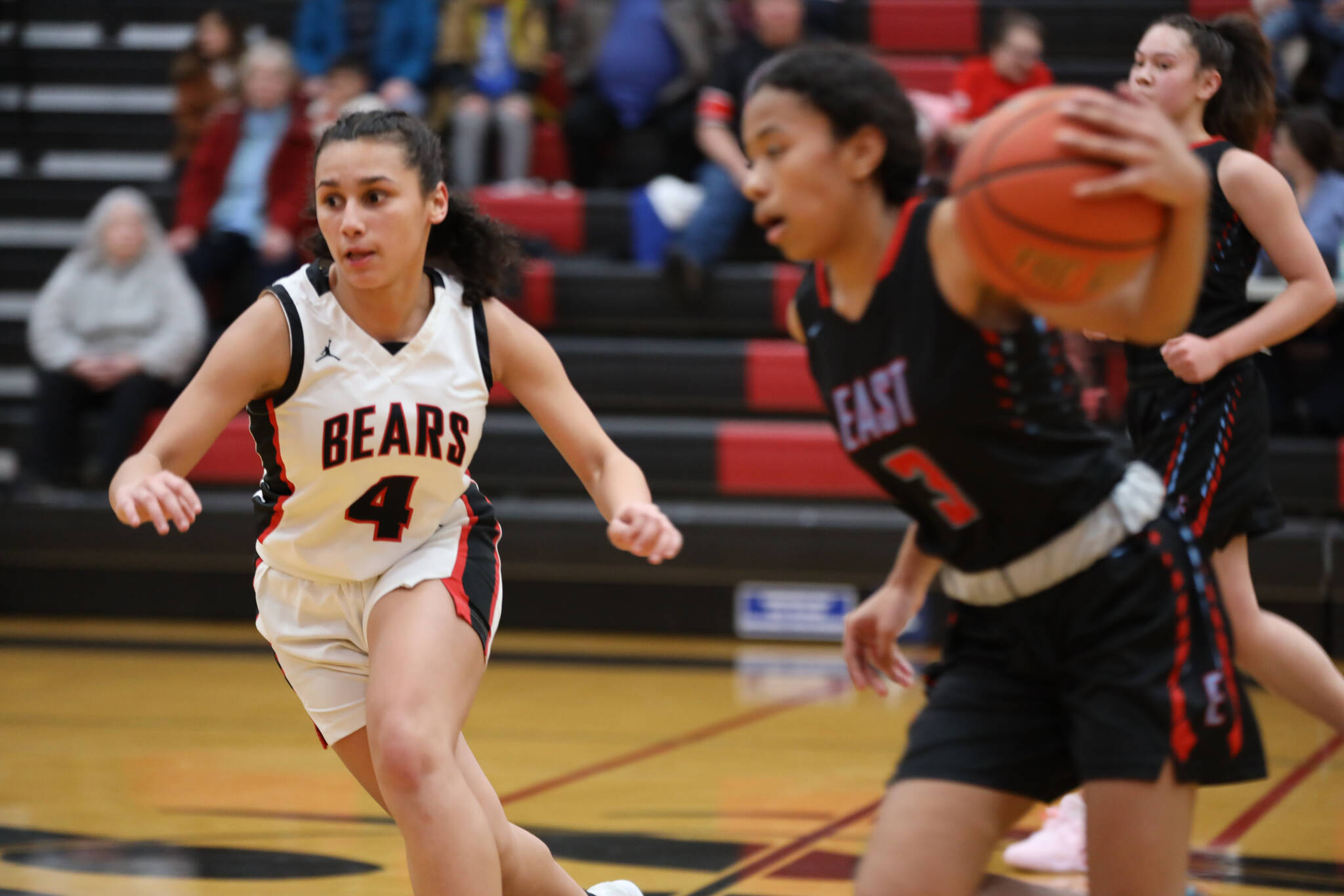 Senior guard Kiyara Miller runs down the court during Wednesday night’s game against Bettye Davis East Anchorage High School during the first night of the Princess Cruises Capital City Classic. (Clarise Larson / Juneau Empire)