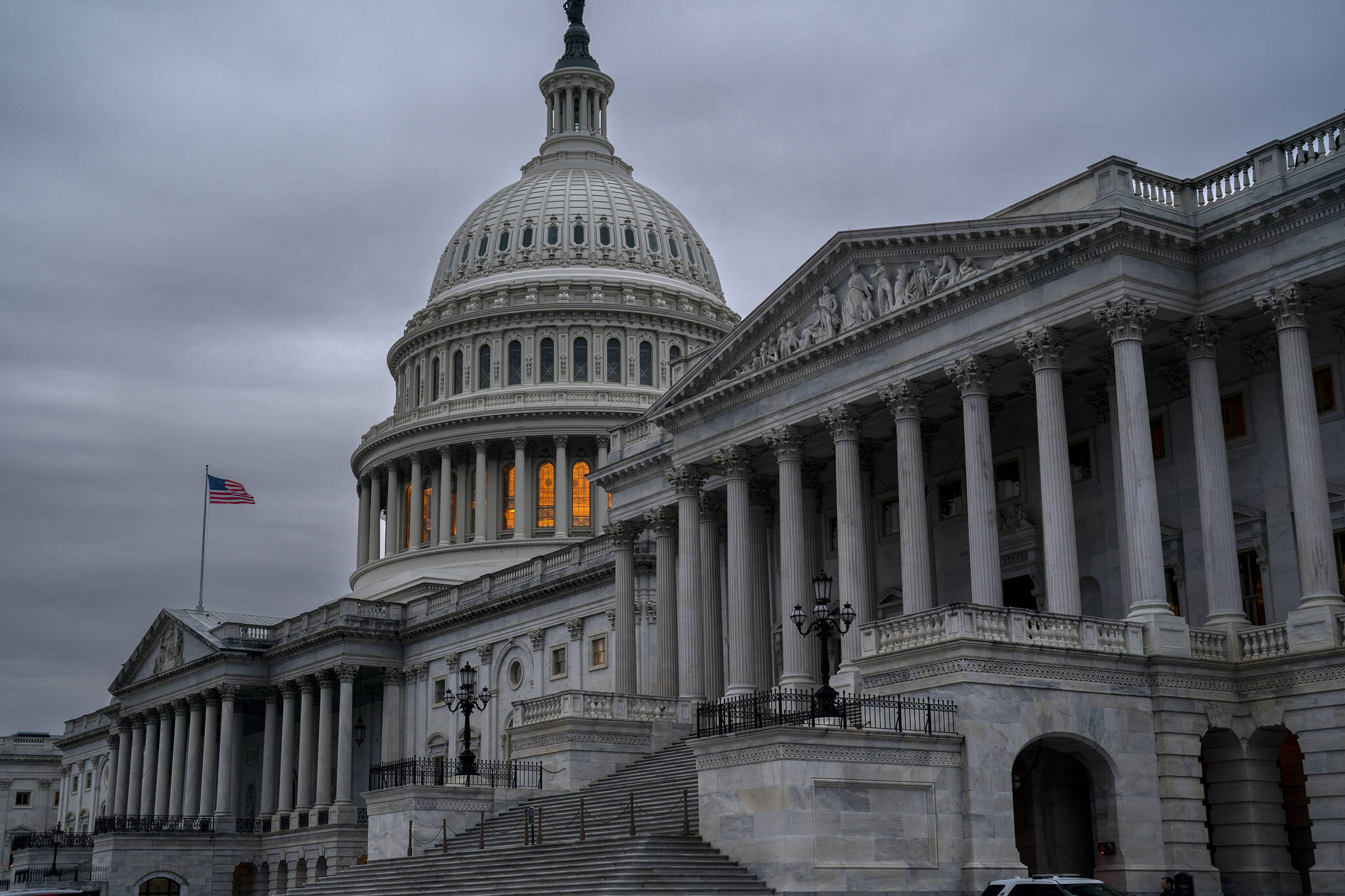 The Senate side of the Capitol is seen in Washington, early Thursday, Dec. 22, 2022, as lawmakers rush to complete passage of a bill to fund the government before a midnight Friday deadline, at the Capitol in Washington, Thursday, Dec. 22, 2022. (AP Photo / J. Scott Applewhite)