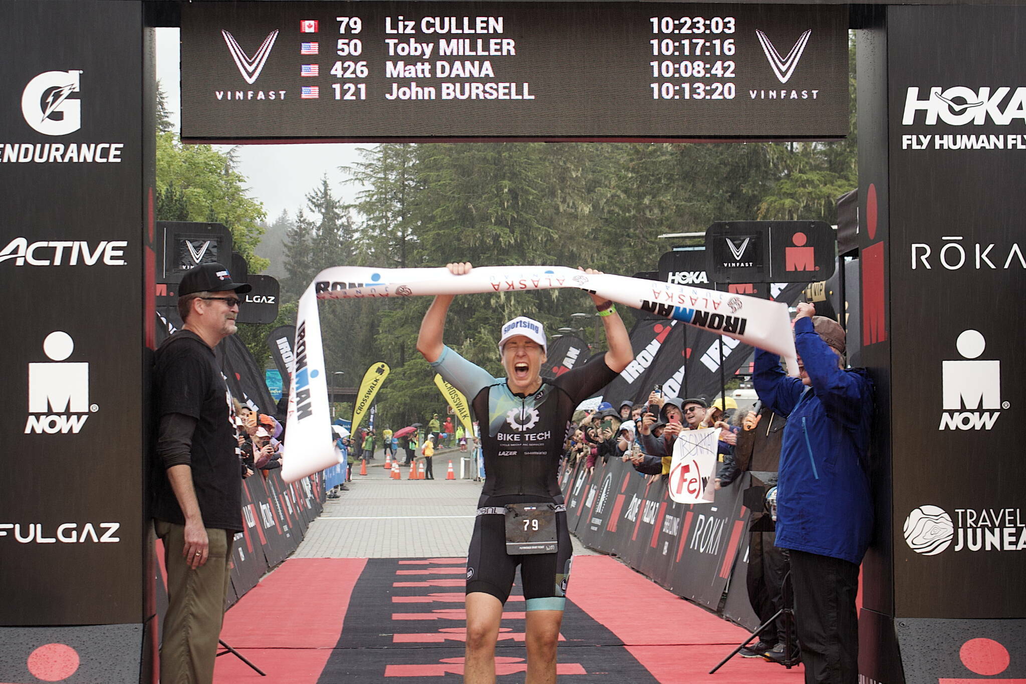 Liz Cullen of West Vancouver celebrates after finishing with the top woman’s time in Ironman Alaska on Aug. 7. About 850 athletes plus other visitors brought about $7 million to Juneau’s economy during what was supposed to be the first of three annual triathlons, but the subsequent two years were cancelled due to what race officials called economic concerns. (Mark Sabbatini / Juneau Empire)(Mark Sabbatini / Juneau Empire)