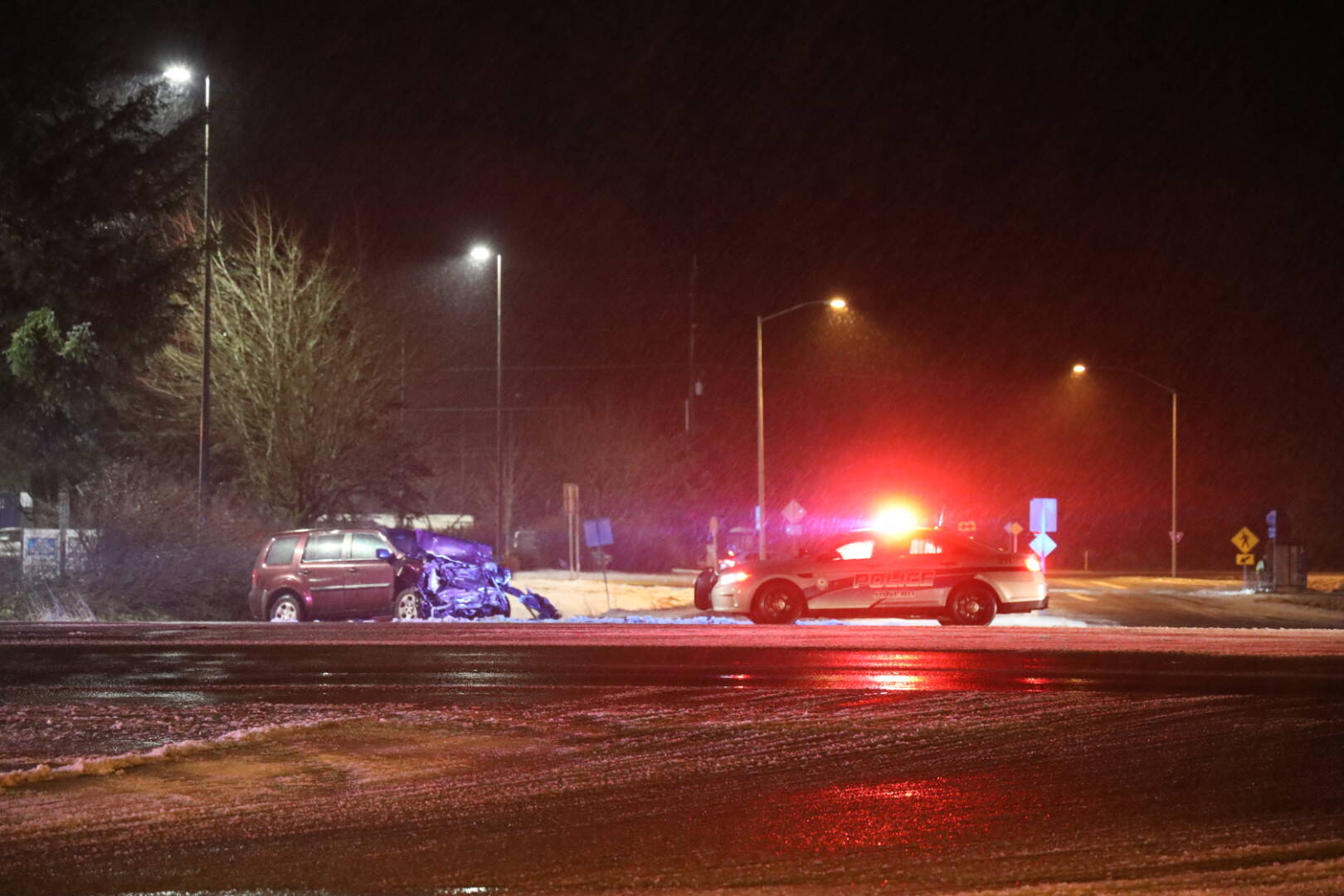 Juneau Police Department responds to motor vehicle crash on Egan Drive near Fred Meyer on Monday night. (Clarise Larson / Juneau Empire)