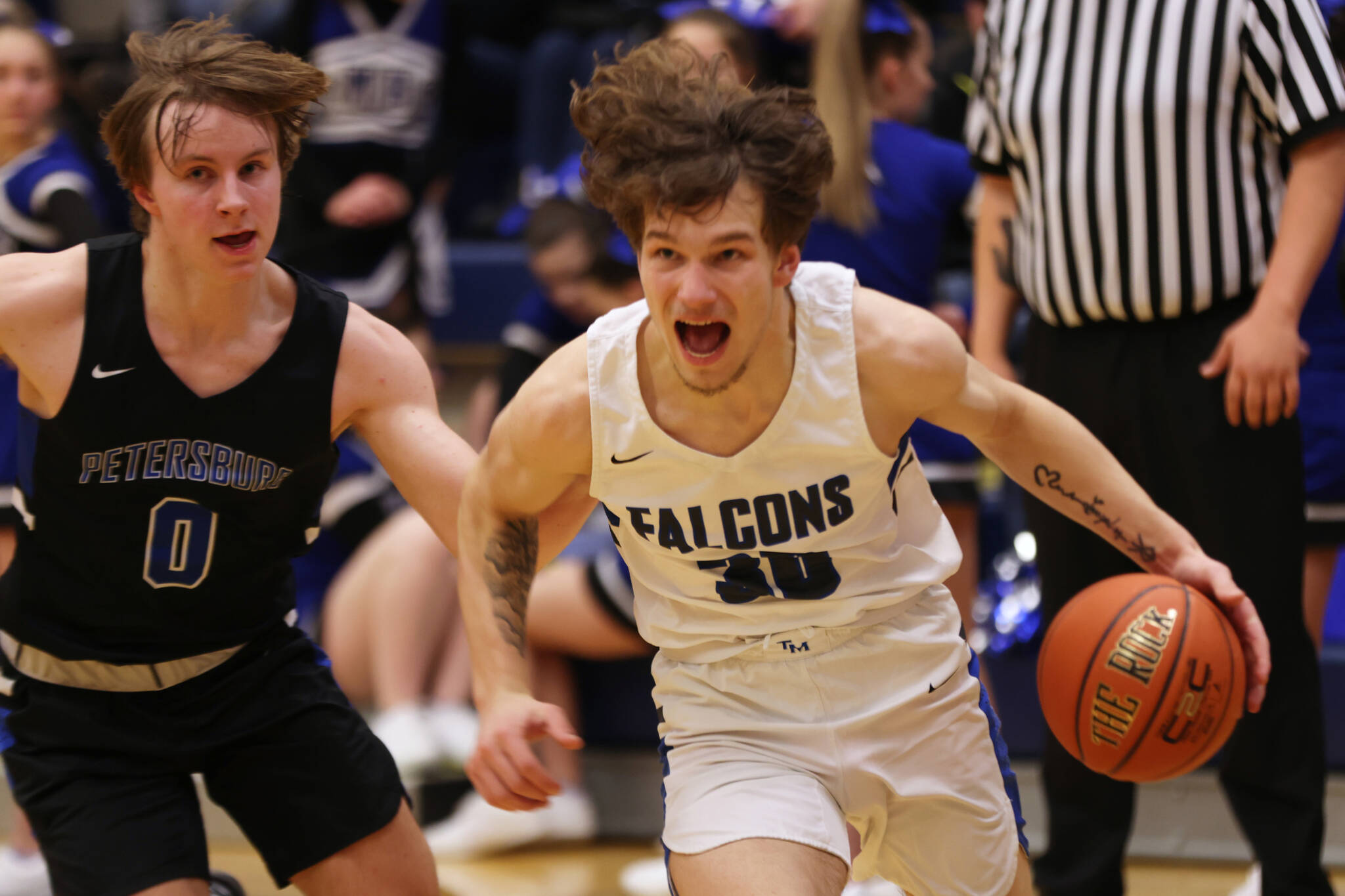 Thomas Baxter makes his way down the court during the third quarter of a TMHS home win. The Falcons will return to the Thunder Dome for a Tuesday game against Service High School. (Ben Hohenstatt / Juneau Empire File)
