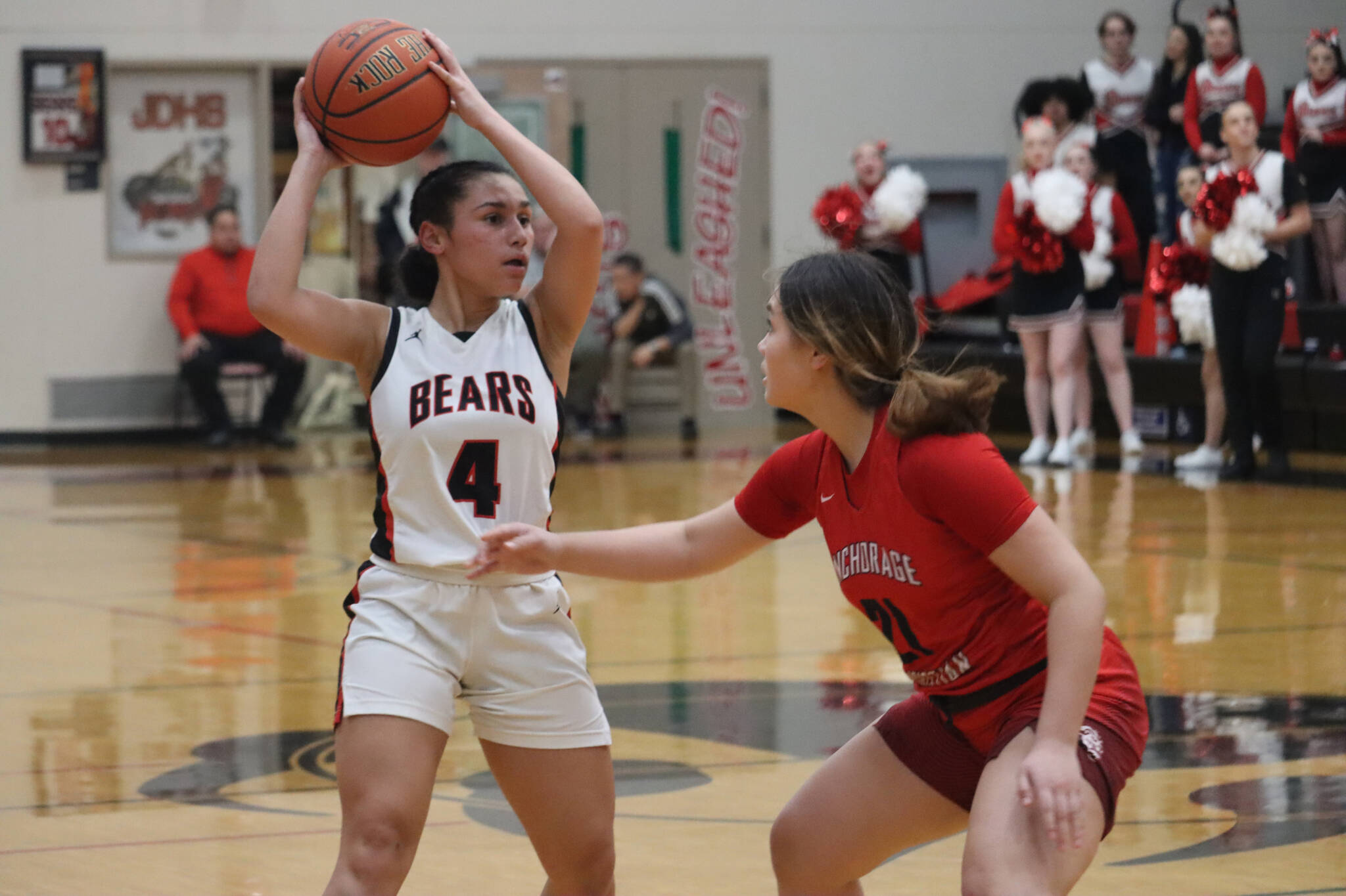 JDHS senior guard Kiyara Miller looks for an open teammate for a pass during the final game of the Capital City Classic tournament on Friday. (Jonson Kuhn / Juneau Empire)