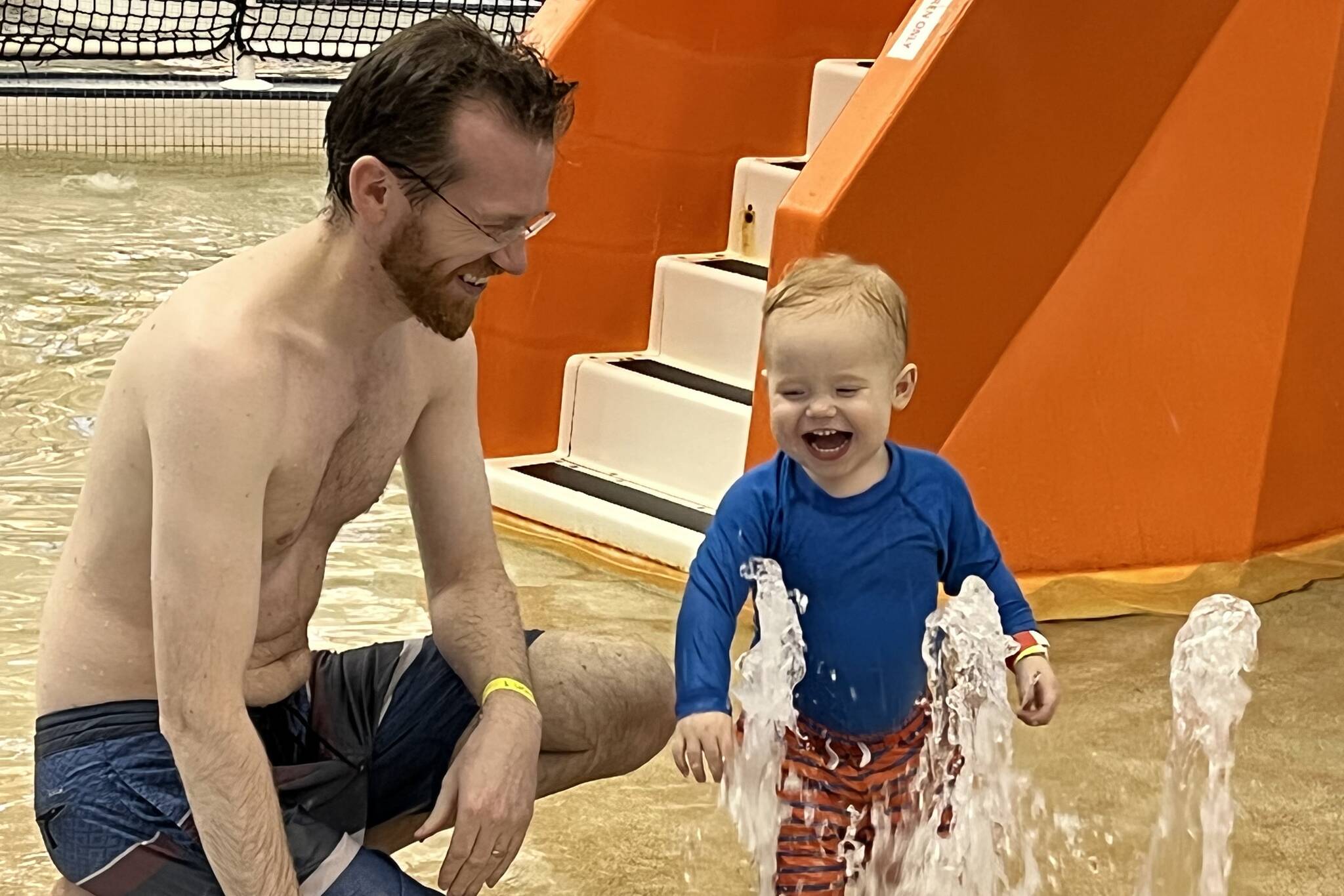 James Snookes plays with his son Harry in the pool at the Dimond Park Aquatic Center as part of the SAFE Child Advocacy Center’s free sponsored event Family Day at the Pool. (Jonson Kuhn / Juneau Empire)